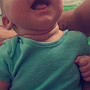 Adan participe au concours pour gagner de l'argent avec cette photo : baby, child, closeup, clothing, cute, expression, face, hand, happy, head, indoor, infant, laughing, onesie, person, portrait, skin, smiling, torso, young