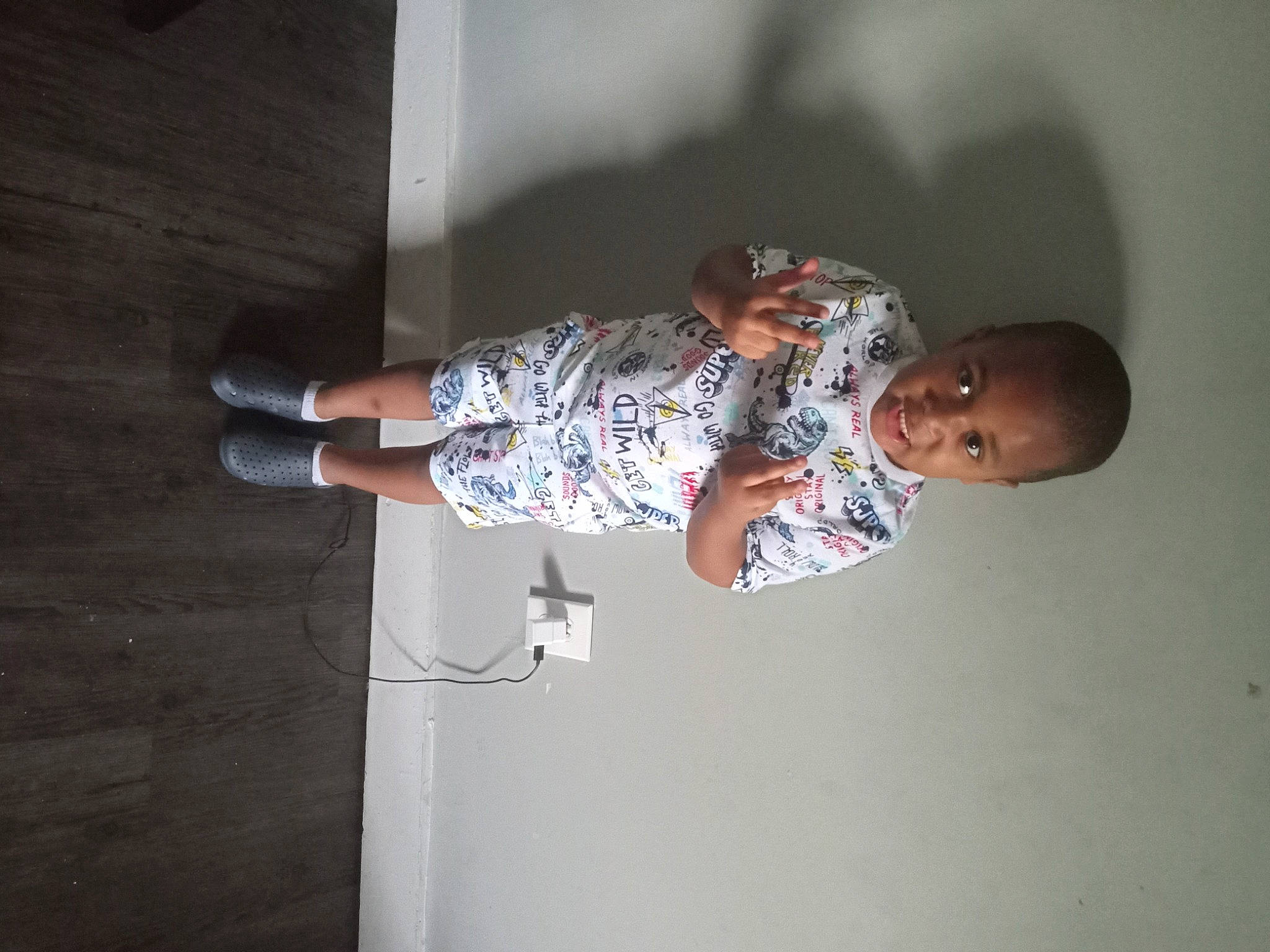 Jahmear joined the competition — help win amazing prizes! ceiling, child, door, elbow, flash_photography, flooring, fun, human_leg, knee, person, plaster, room, sitting, sleeve, t_shirt, toddler, visual_arts, wood