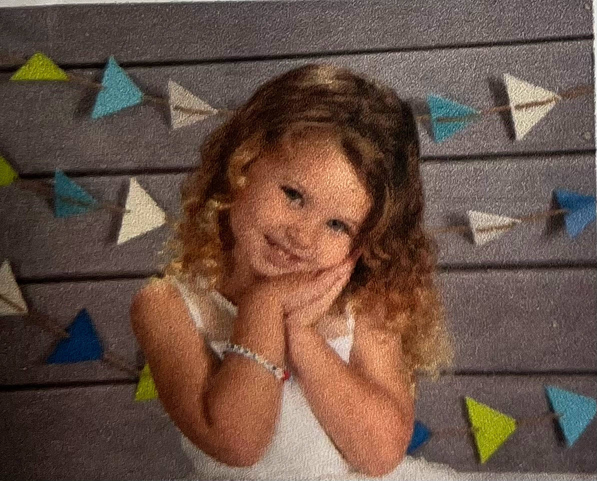 Lillian joined the competition — help win amazing prizes! art, blond, child, facial_expression, finger, flooring, fun, gesture, hairstyle, happy, illustration, joy, leisure, long_hair, pattern, person, sitting, smile, thumb, toddler