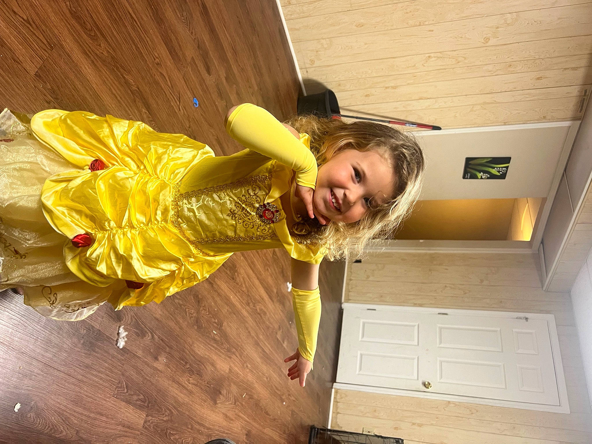 Lillian is registered to the contest to win money with this photo: child, flooring, fun, happy, hardwood, joy, leisure, person, room, smile, toddler, wood