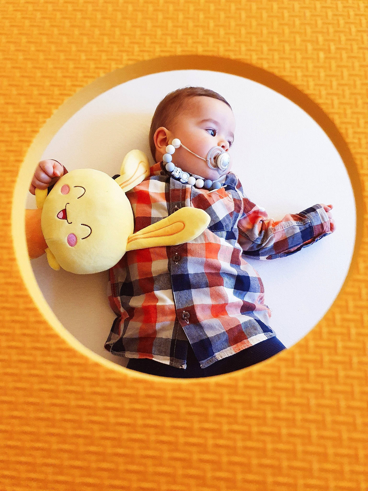 Luis Junior participe au concours pour gagner de l'argent avec cette photo : baby_toddler_clothing, baby_toys, carmine, child, circle, design, doll, figurine, hair, happy, pattern, person, plaid, room, shelf, sleeve, tartan, textile, toddler, toy