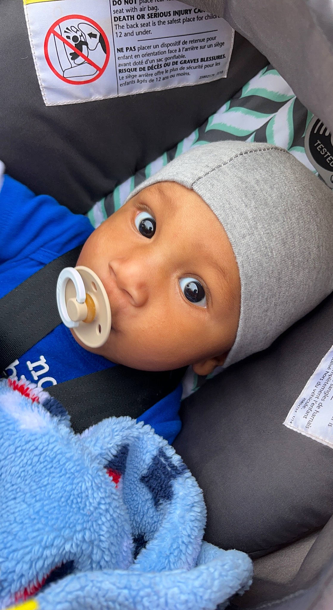 Wise is registered to the contest to win money with this photo: baby, baby_products, baby_toddler_clothing, beanie, cap, cheek, child, comfort, electric_blue, eyelash, hat, headgear, headwear, knit_cap, linens, lip, nose, person, stuffed_toy, textile