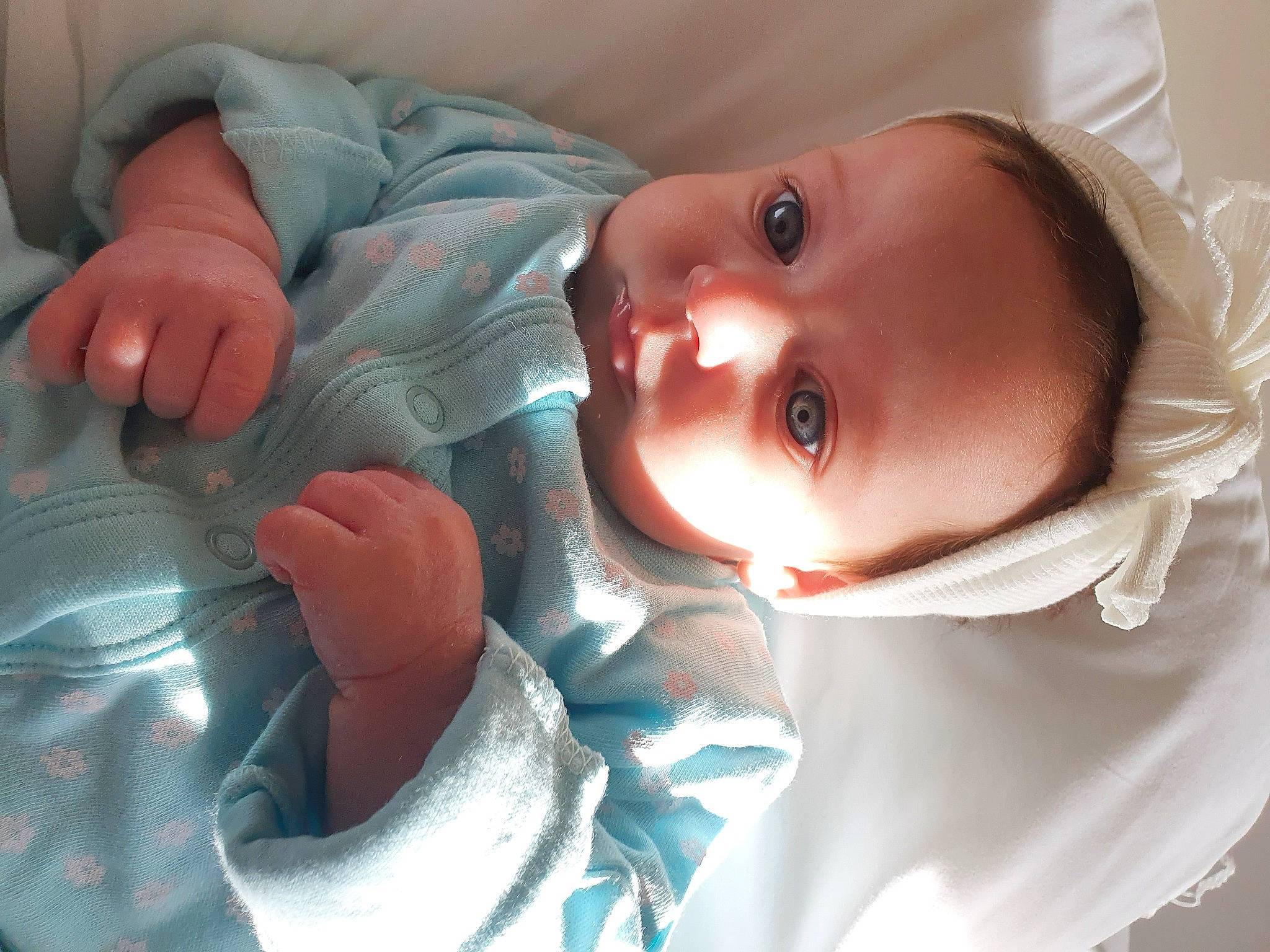 Elodie joined the competition — help win amazing prizes! baby, baby_toddler_clothing, cheek, comfort, ear, eye, eyebrow, eyelash, finger, gesture, hand, happy, iris, lip, mammal, mouth, nose, organ, person, skin