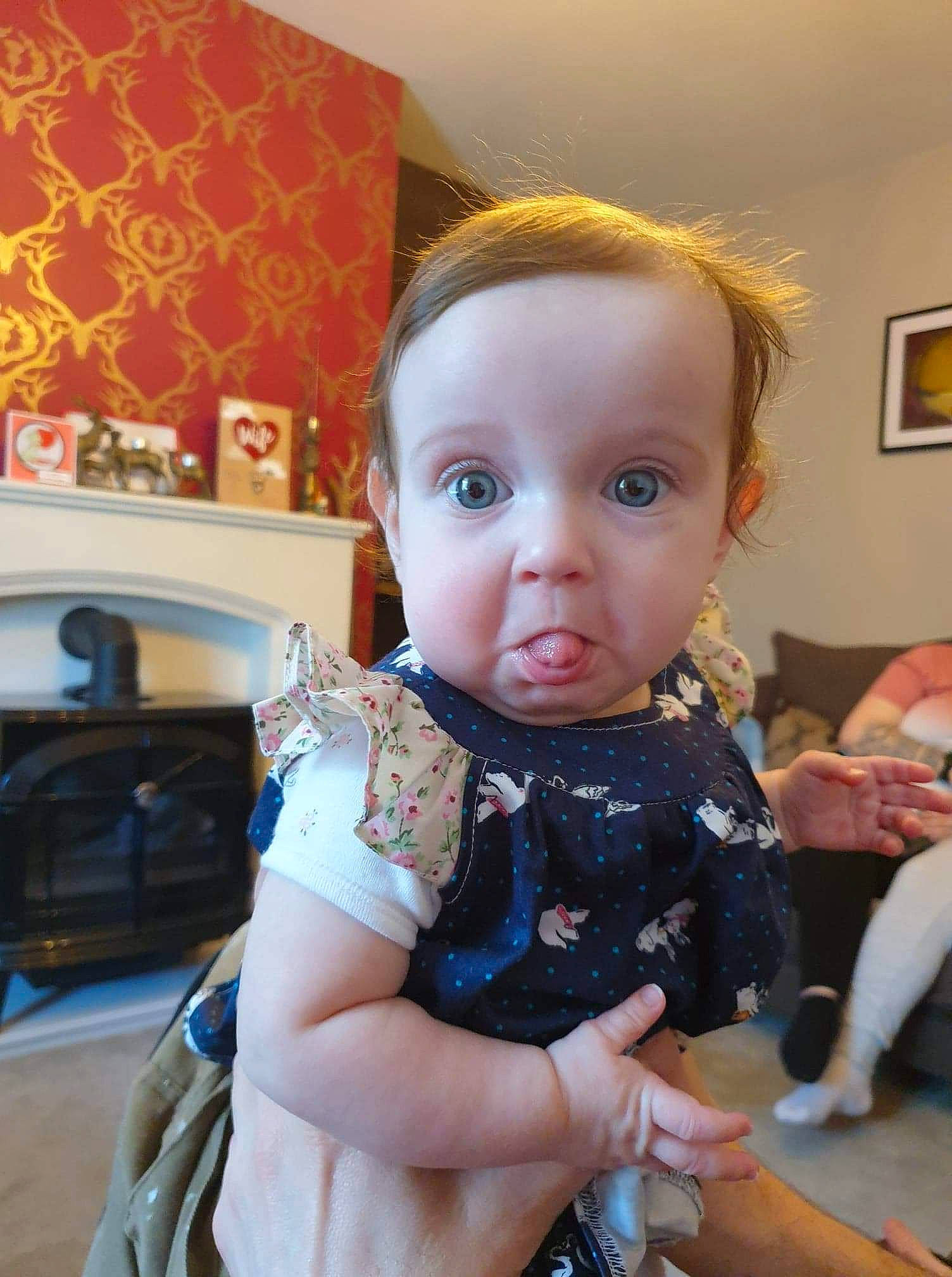 Elodie joined the competition — help win amazing prizes! baby, baby_products, baby_toddler_clothing, bag, chair, cheek, child, eyelash, fun, happy, iris, luggage_and_bags, pattern, person, picture_frame, room, sitting, sleeve, surprise, toddler