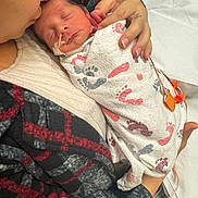 Milan joined the competition — help win amazing prizes! newborn, baby, adult, blanket, hospital, medical_tube, sleeping, holding, love, care, skin, face, hand, bed, clothing, person, portrait, intimacy, comfort, tenderness