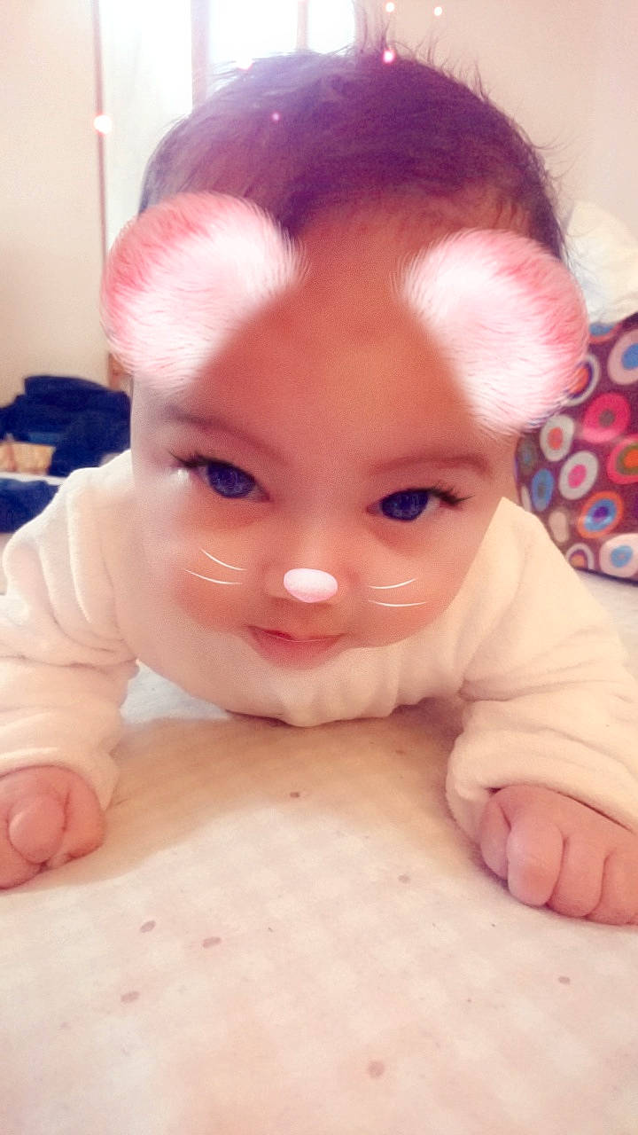 Kaéllia a rejoint le concours — aidez-le/la à gagner de superbes lots ! cheek, child, doll, ear, eye, eyebrow, face, finger, forehead, head, human_hair_color, infant, iris, lip, mouth, neck, nose, person, pink, skin