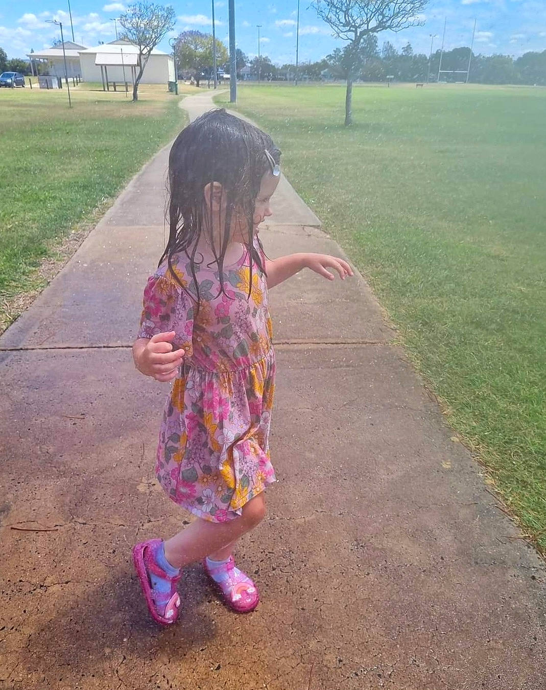 Kaitlyn is registered to the contest to win money with this photo: asphalt, dress, fun, grass, grass_family, grassland, happy, landscape, leisure, magenta, people, people_in_nature, person, pink, plant, recreation, road, sky, summer, tree