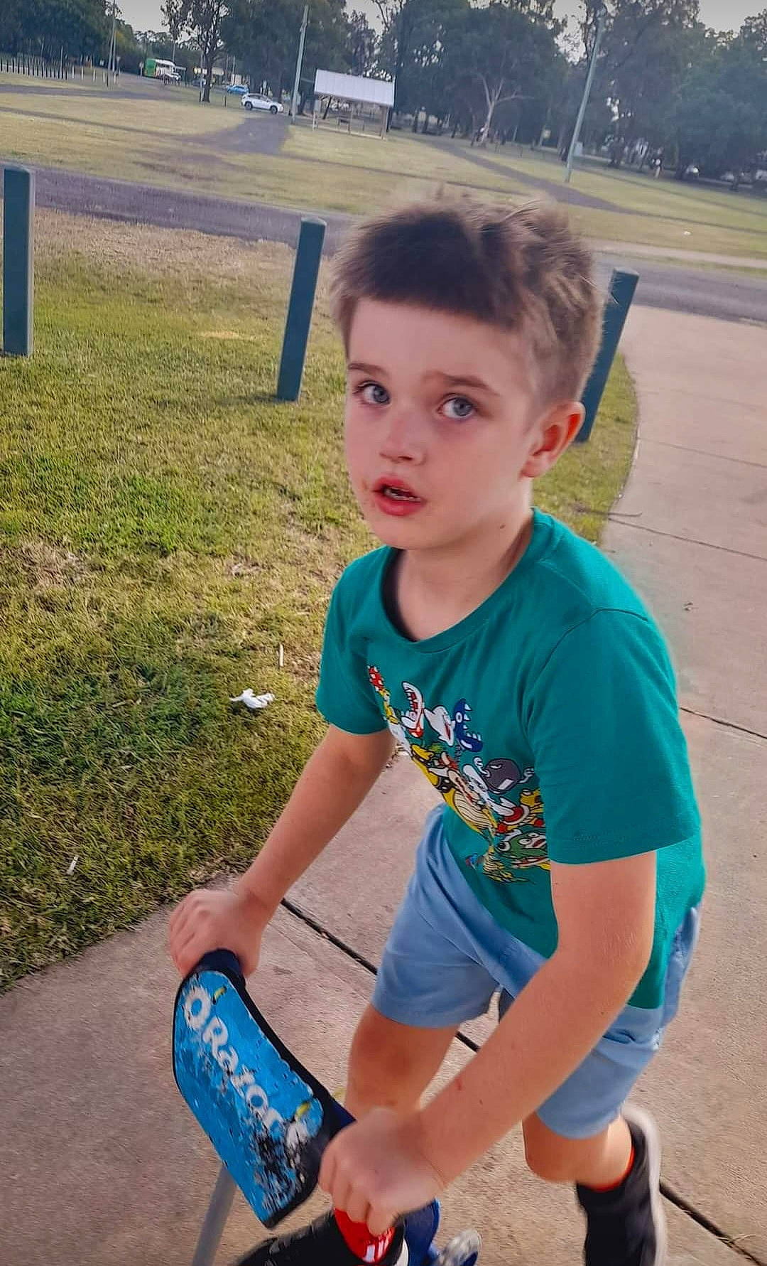 Liam joined the competition — help win amazing prizes! asphalt, child, cool, electric_blue, fun, grass, happy, human_leg, leisure, person, plant, play, recreation, shoe, sitting, snapshot, sneakers, soil, t_shirt, tin_can