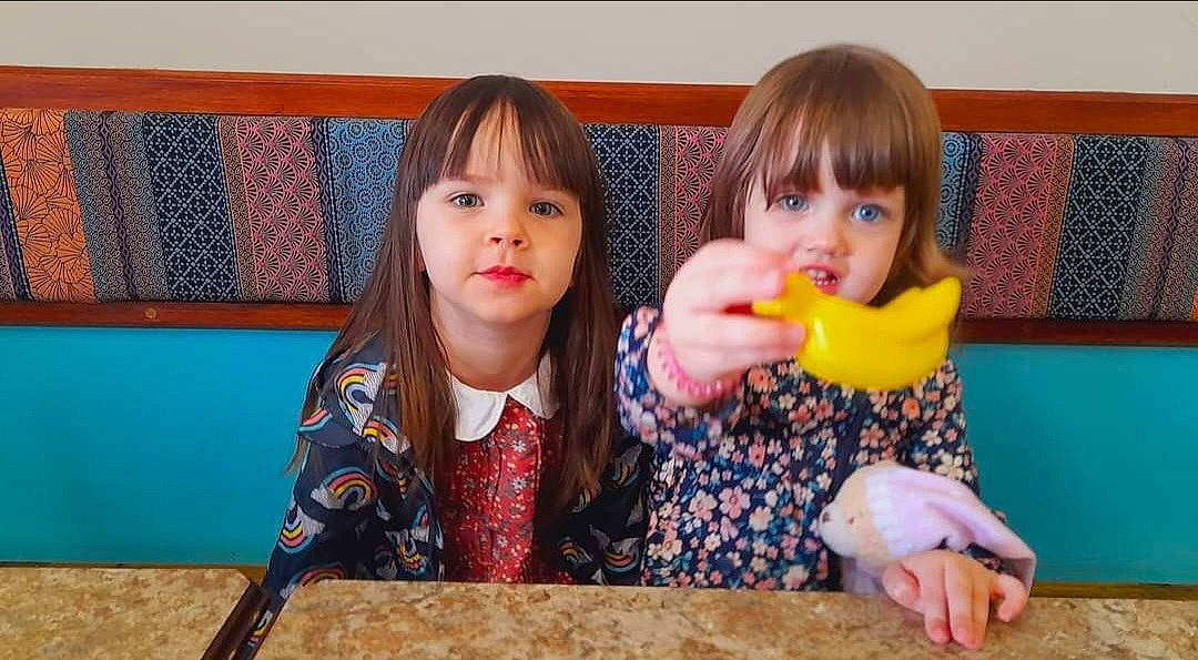 Grace-lyn joined the competition — help win amazing prizes! chair, child, dress, event, face, fun, happy, leisure, party, people, person, play, recreation, room, sharing, sitting, t_shirt, table, tableware, toddler