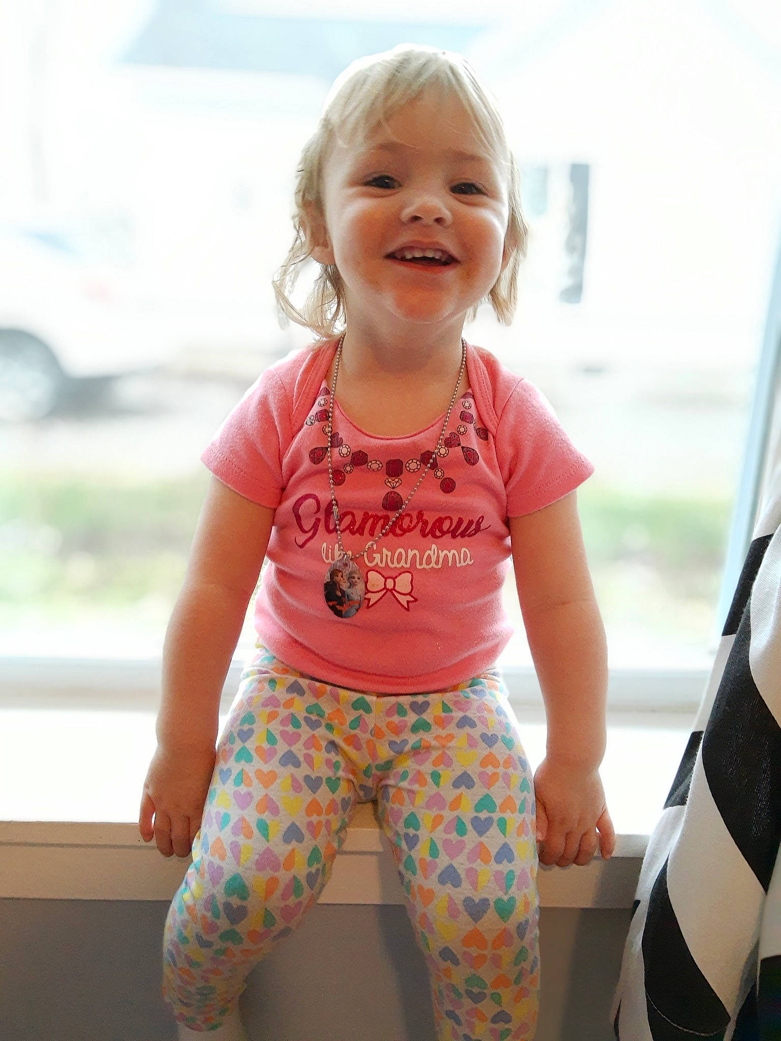 Joy is registered to the contest to win money with this photo: baby, baby_products, baby_toddler_clothing, child, child_model, clothing, design, joy, leggings, pattern, person, product, sleeve, sportswear, t_shirt, toddler