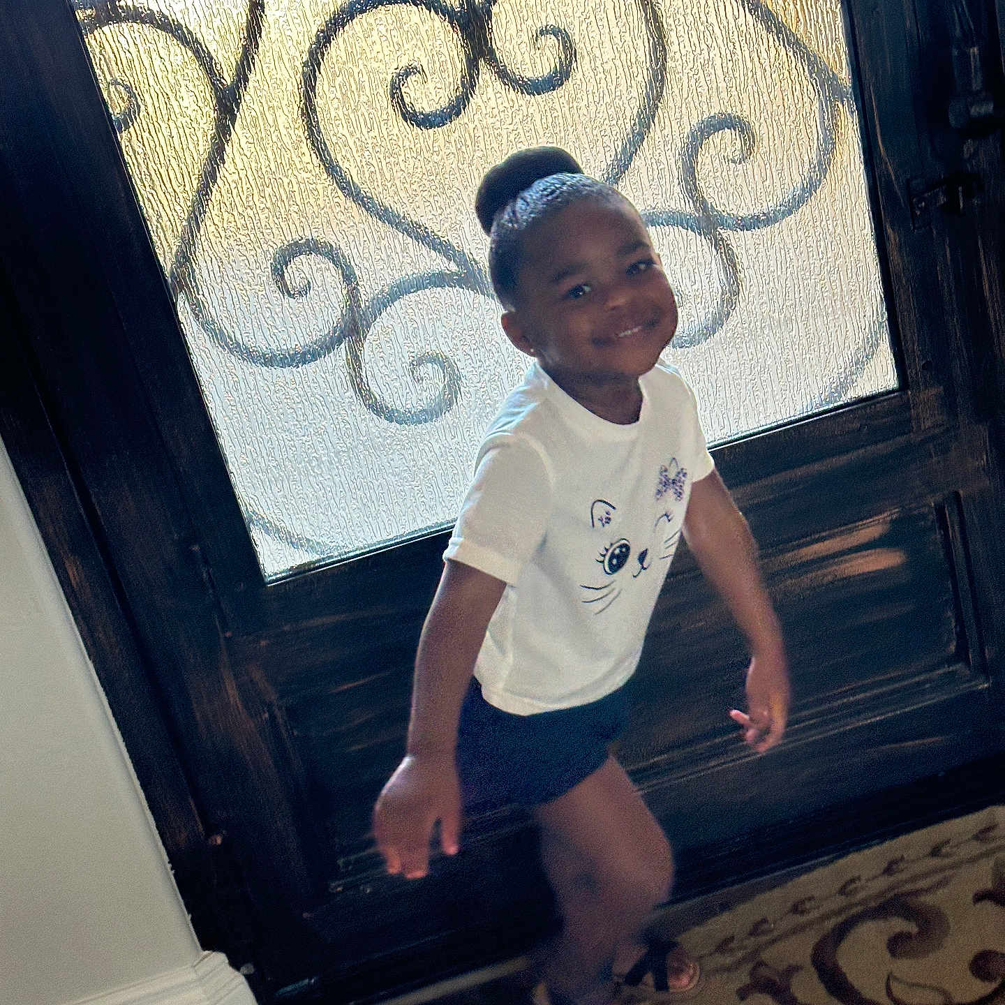 Daejanae Bowen joined the competition — help win amazing prizes! bodypart, boy, child, clothing, door, face, finger, hand, happy, hardwood, head, male, pants, person, photography, portrait, shorts, smile, t_shirt, wood