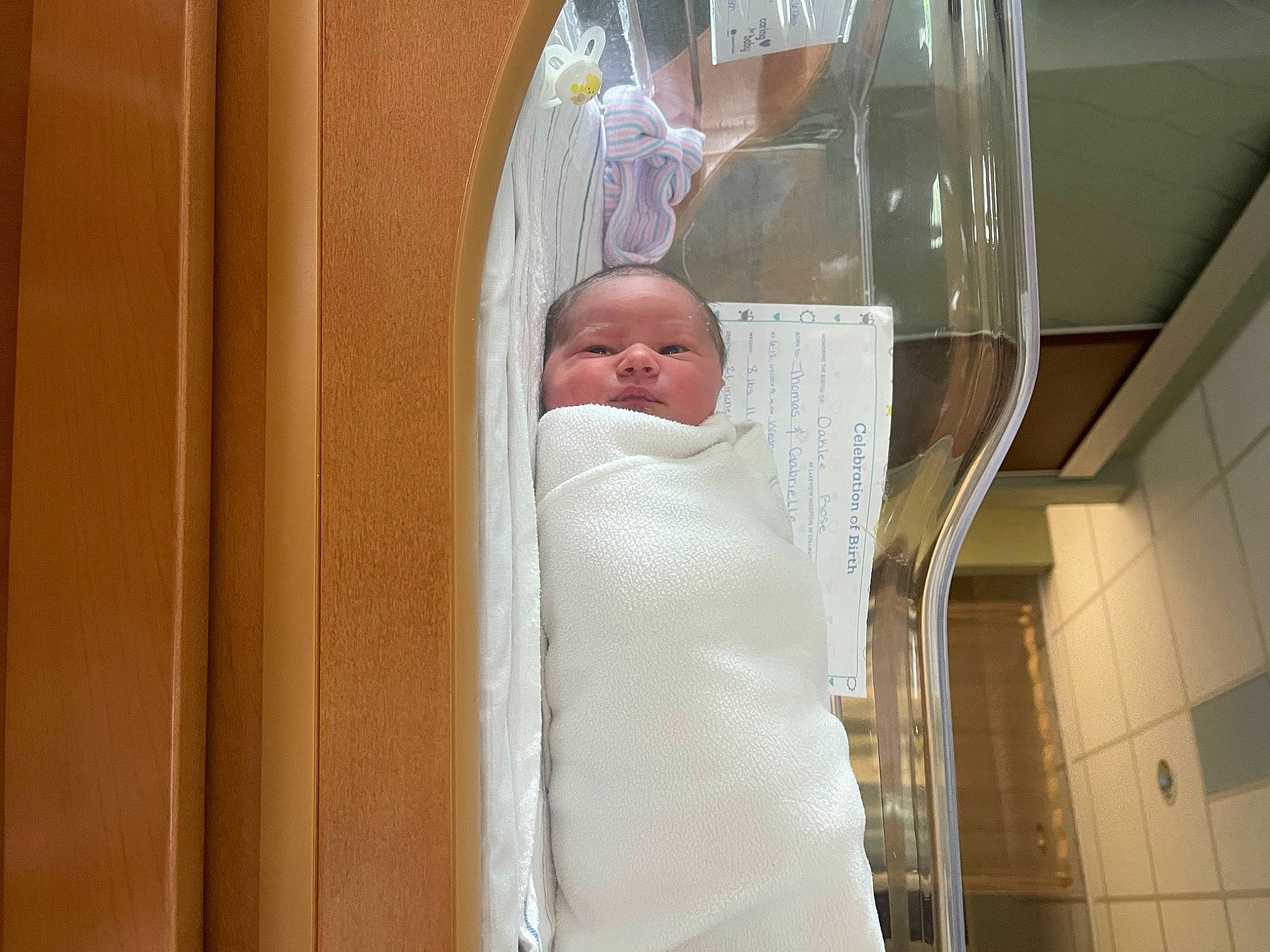 Oaklee is registered to the contest to win money with this photo: abdomen, baby, baby_products, baby_safety, baby_toddler_clothing, bed, bedding, chest, child, comfort, health_care, hospital, infant_bed, linens, medical, medical_equipment, person, room, service, smile