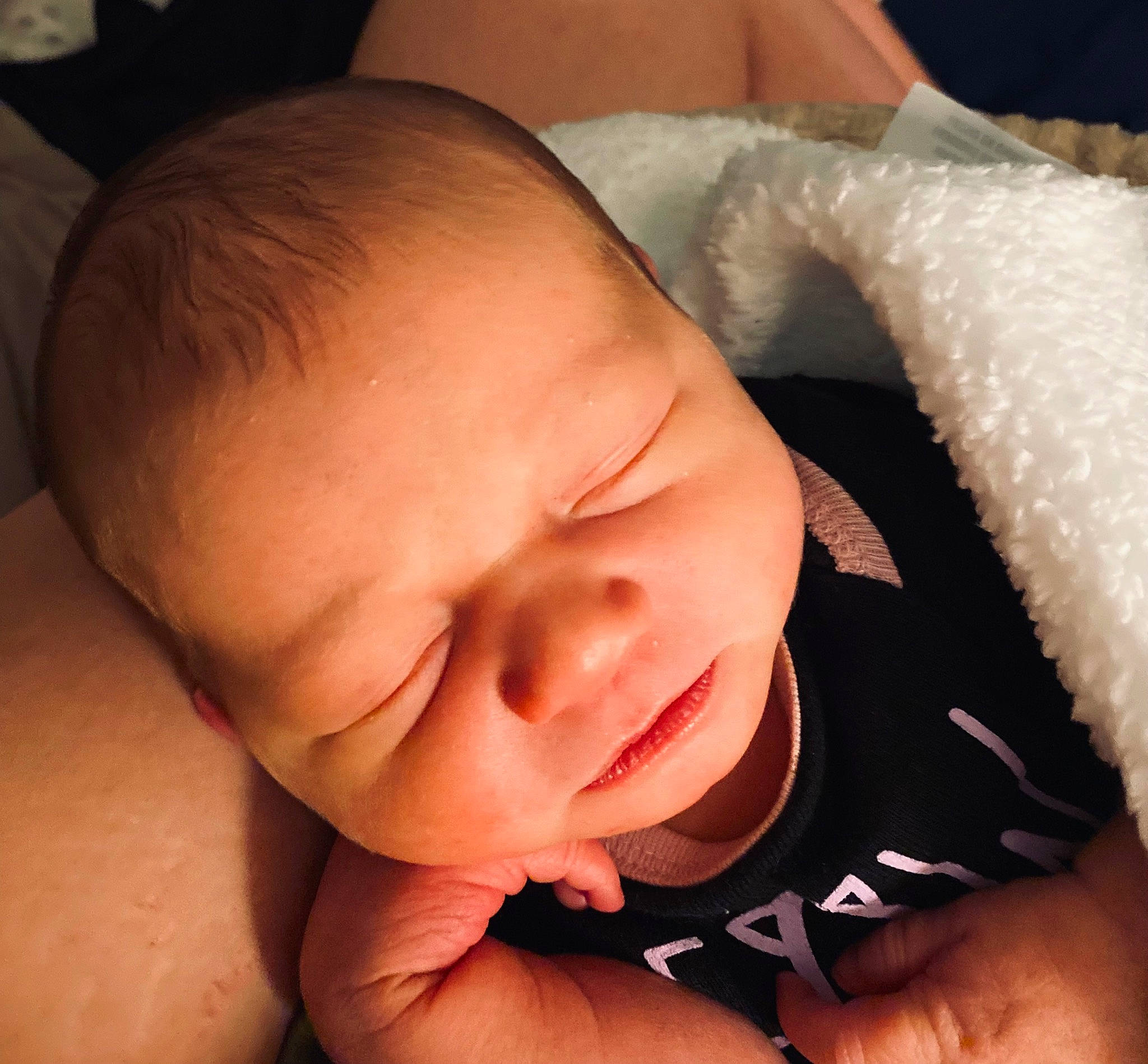 Amber is registered to the contest to win money with this photo: arm, baby, cheek, chin, comfort, ear, eye, eyelash, finger, gesture, head, iris, lip, mouth, nail, neck, nose, person, skin, thumb