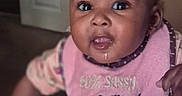 Ariyana joined the competition — help win amazing prizes! adorable, baby, babywear, bib, child, closeup, clothing, cute, cute_face, drool, expression, eyes, face, indoor, infant, person, pink, portrait, sitting, young