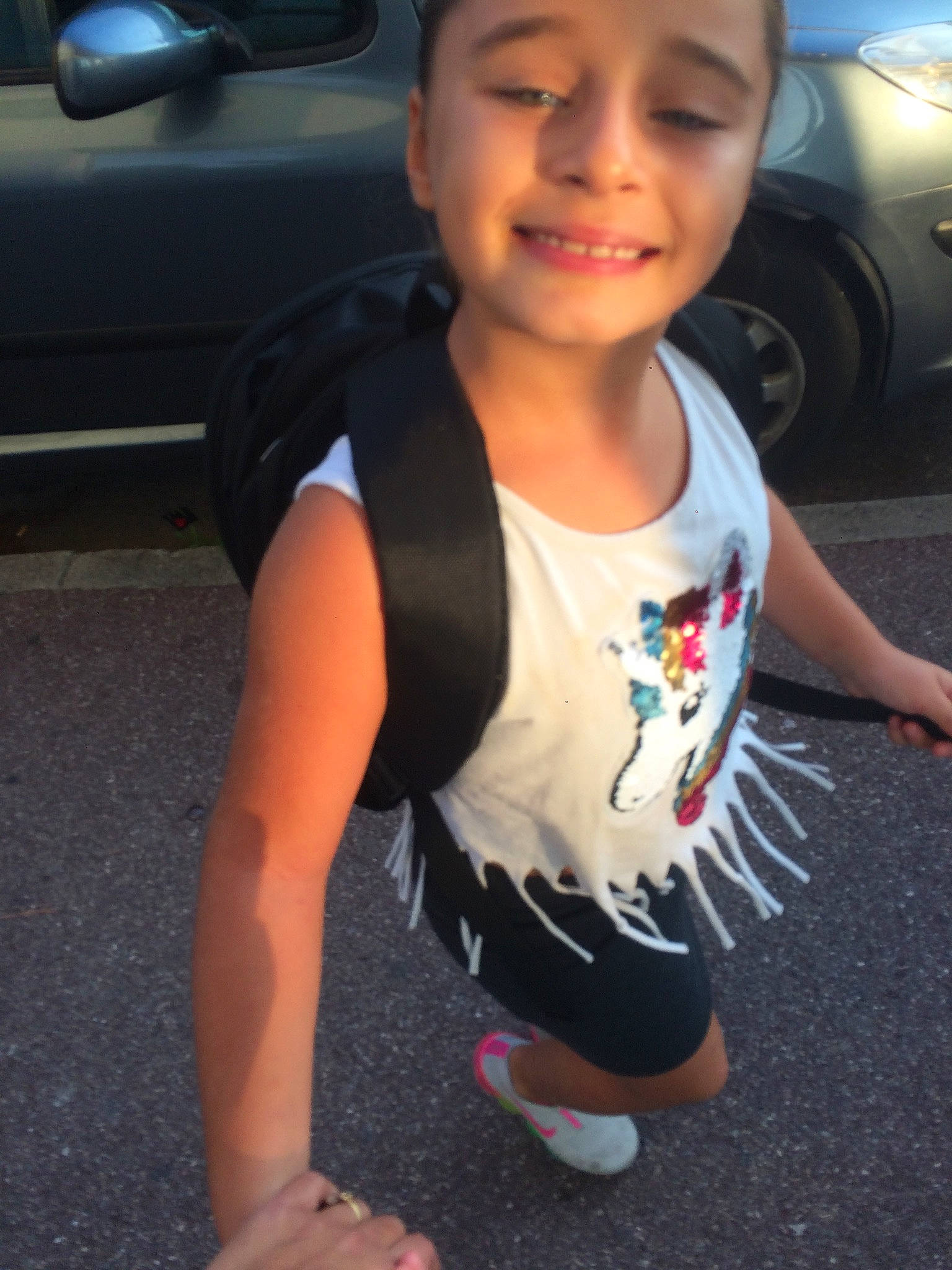 Kenza participe au concours pour gagner de l'argent avec cette photo : arm, black_hair, cheek, child, cool, face, fun, joint, joy, leg, muscle, person, shoulder, skin, smile, sportswear, summer, t_shirt, toddler, vacation