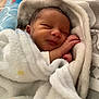Raymon is registered to the contest to win money with this photo: newborn, baby, sleeping, blanket, soft, cozy, infant, wrapped, cute, hand, face, peaceful, resting, warm, clothing, indoors, portrait, child, toddler, closeup