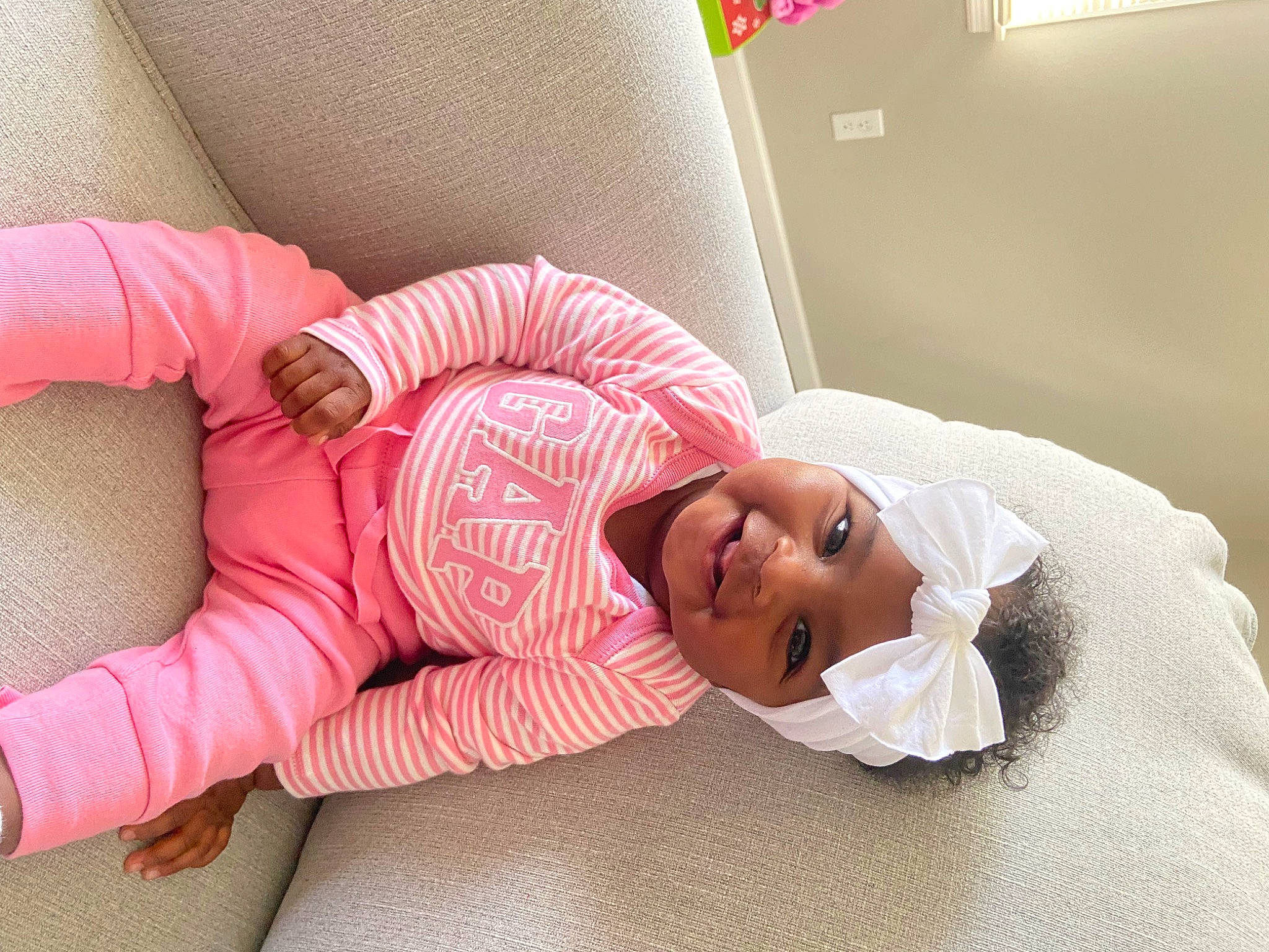 Melani joined the competition — help win amazing prizes! baby, baby_sleeping, baby_toddler_clothing, bed, child, comfort, foot, hat, headwear, human_leg, joy, knee, leg, linens, person, room, skin, sleeve, sock, sunglasses