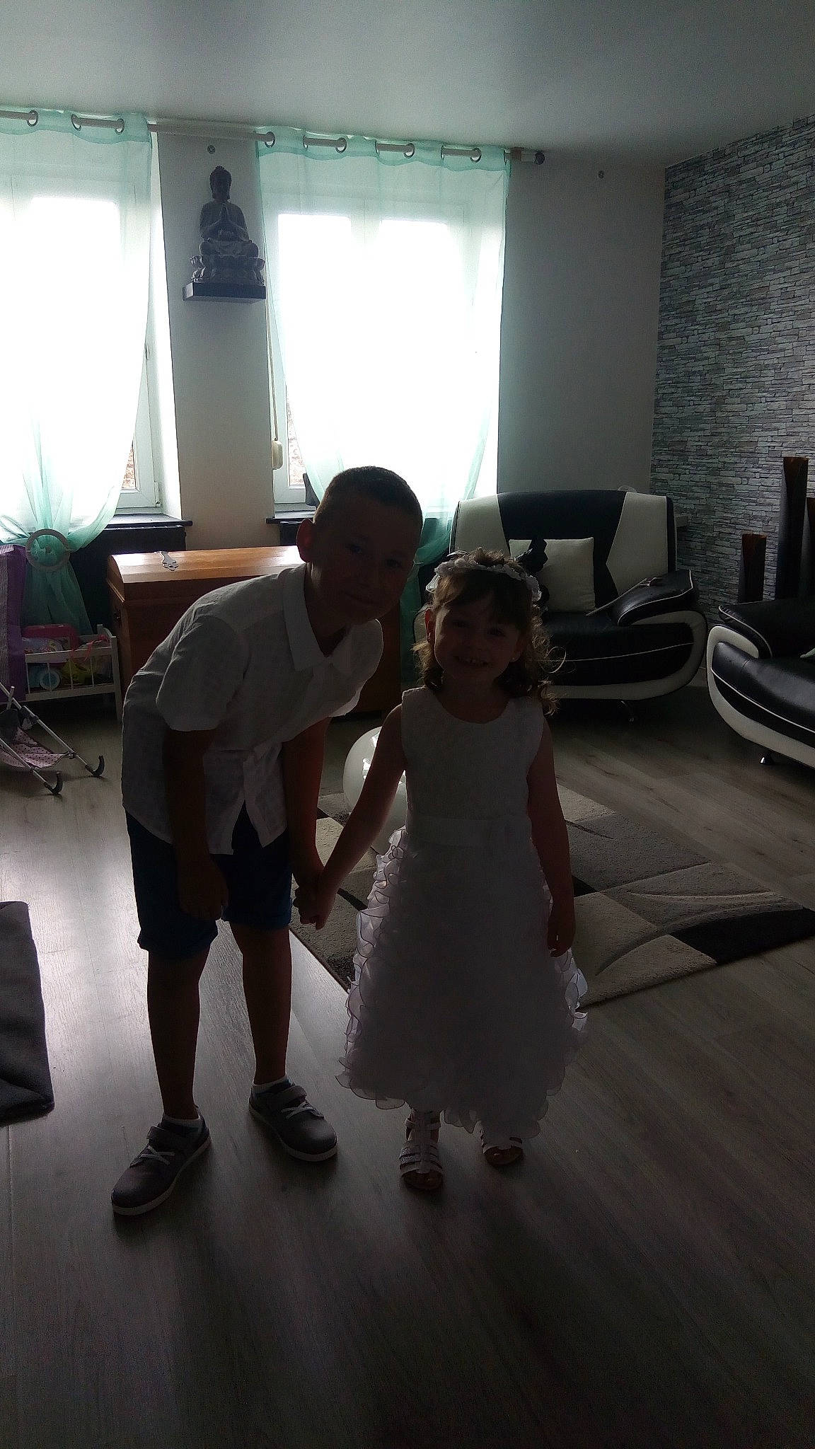 Kenzie participe au concours pour gagner de l'argent avec cette photo : automotive_design, couch, curtain, dress, entertainment, event, eyewear, fashion_design, floor, flooring, formal_wear, fun, gesture, happy, joy, luxury_vehicle, person, room, sandal, shoe