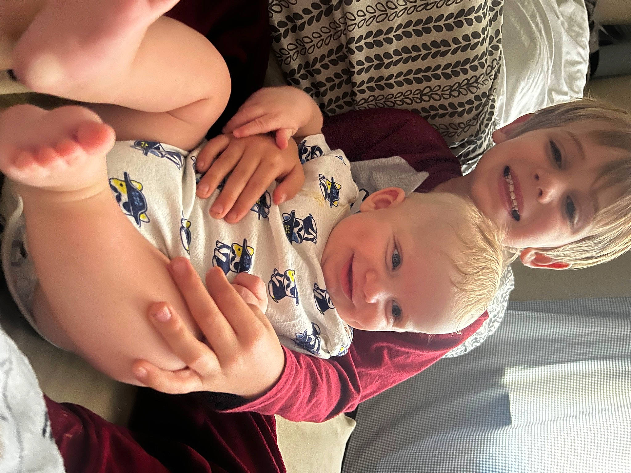 Korbyn is registered to the contest to win money with this photo: arm, baby, cheek, eye, face, facial_expression, finger, gesture, hand, happy, head, human_body, interaction, joy, mammal, mouth, person, product, skin, smile