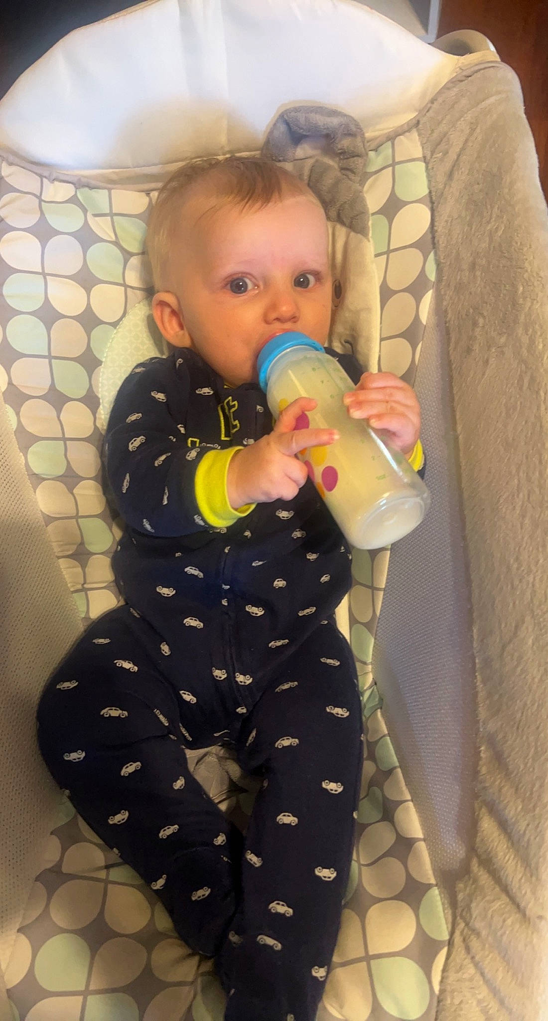 Korbyn is registered to the contest to win money with this photo: baby, baby_bottle, baby_products, baby_safety, baby_toddler_clothing, baby_toys, bottle, chair, child, comfort, drinkware, fun, pattern, person, plastic, plastic_bottle, room, sitting, skin, toddler