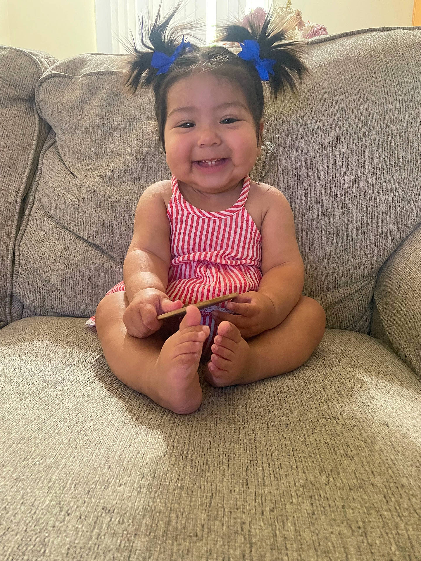 Isla joined the competition — help win amazing prizes! architecture, baby, bodypart, building, couch, cushion, face, finger, furniture, hand, happy, head, homedecor, indoors, livingroom, person, photography, portrait, room, sitting