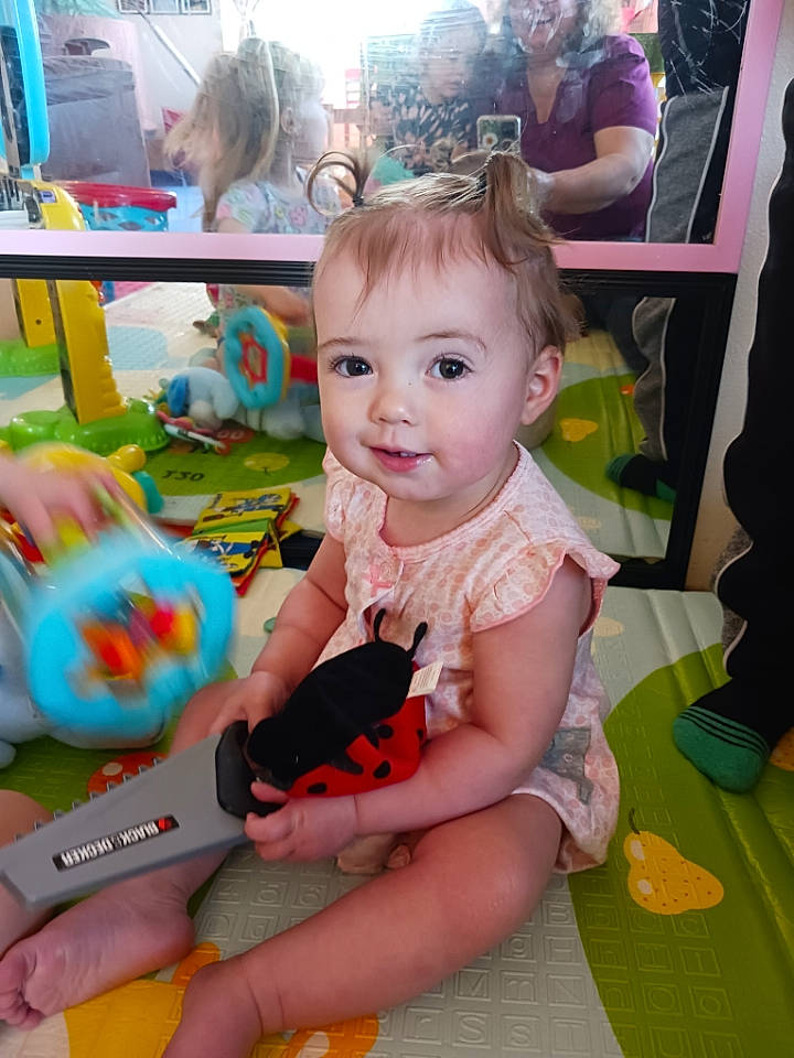 Lilly joined the competition — help win amazing prizes! baby, baby_toddler_clothing, chair, child, event, flooring, fun, happy, iris, leisure, party, person, pink, play, recreation, room, shoe, sitting, skin, toddler