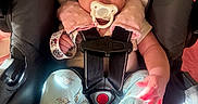 Nyla joined the competition — help win amazing prizes! baby, pacifier, car_seat, headband, bow, pink_neck_pillow, socks, pants, infant, child, seatbelt, straps, indoors, cute, wide_eyes, person, baby_clothes, sitting, soft_lighting, comfort