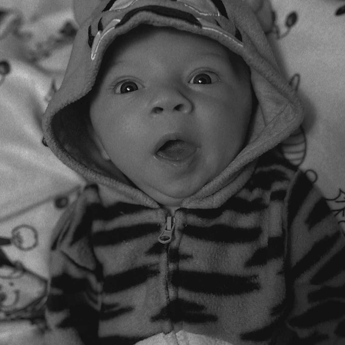 Atticus joined the competition — help win amazing prizes! baby, bonnet, cap, clothing, coat, face, happy, hat, head, hood, hoodie, jacket, knitwear, newborn, person, photography, portrait, smile, sweater, sweatshirt