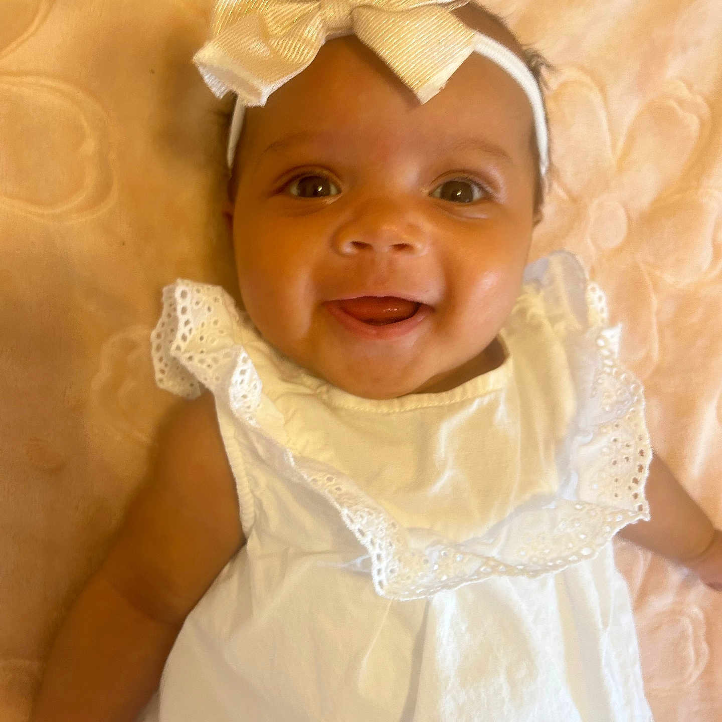 Rayana is registered to the contest to win money with this photo: accessories, baby, bodypart, bonnet, clothing, dress, face, finger, formalwear, hand, happy, hat, head, headband, jewelry, newborn, person, photography, portrait, smile