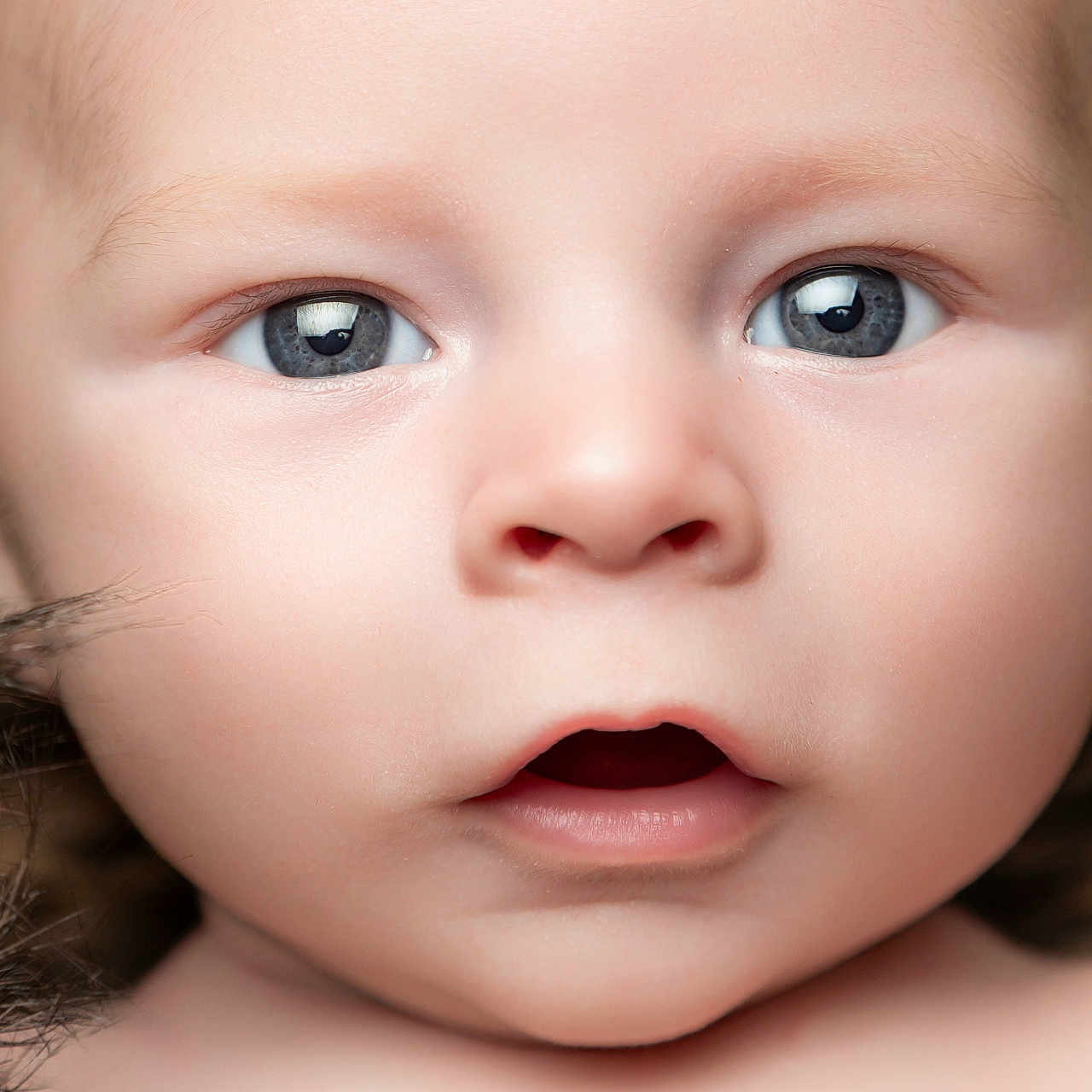 Leighton is registered to the contest to win money with this photo: baby, child, closeup, curious, cute, expression, eyes, face, head, human, infant, innocence, looking, mouth, newborn, person, portrait, skin, soft, young