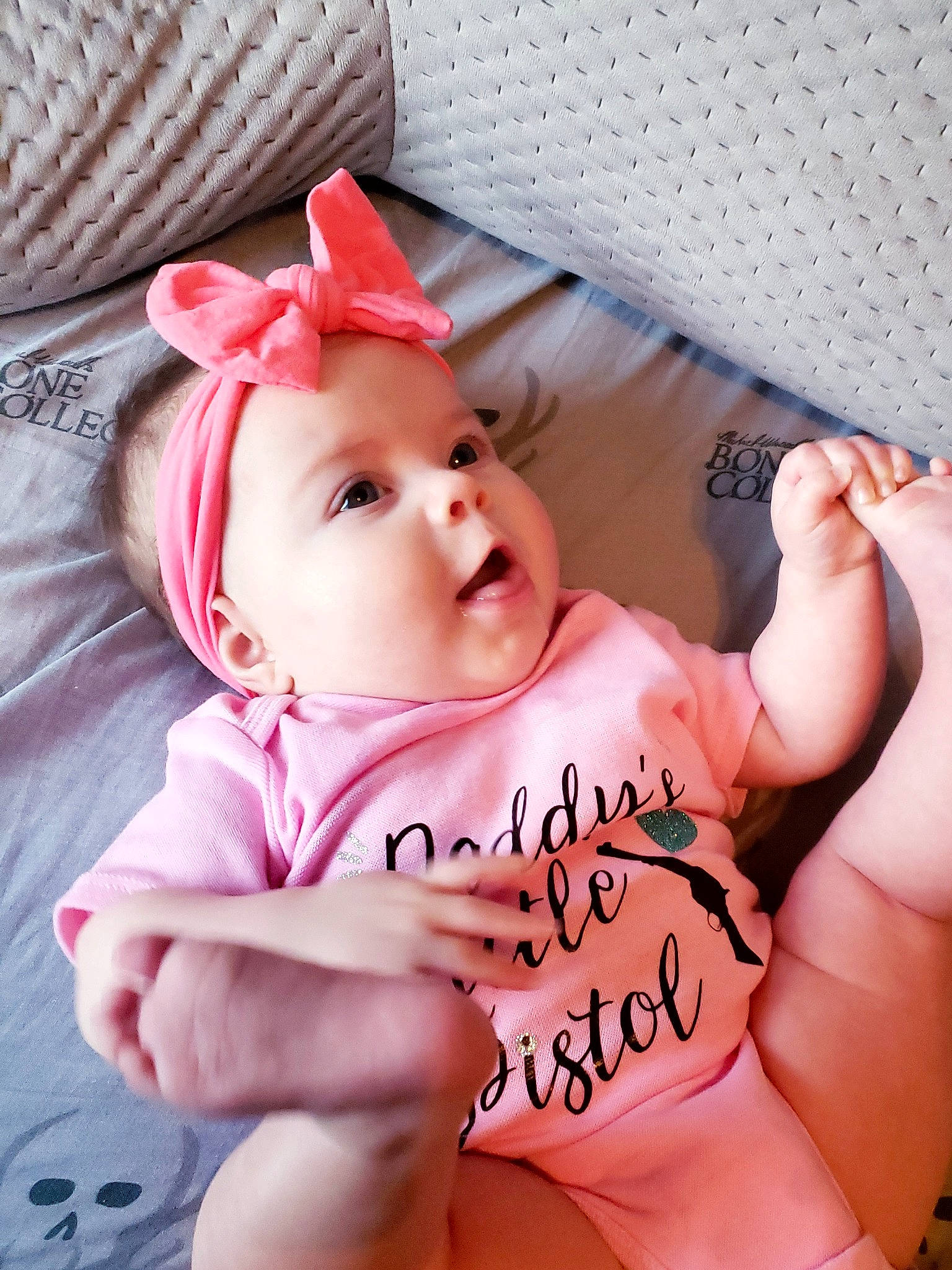 Benelli joined the competition — help win amazing prizes! baby, baby_products, baby_toddler_clothing, cheek, child, comfort, facial_expression, finger, foot, gesture, happy, headwear, linens, mouth, nail, person, pink, product, skin, smile