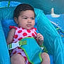 baby, child, infant, swimsuit, polka_dot, floatation_device, pool, water, blue, pink, red, sunlight, shadow, skin, feet, hand, face, expression, summer, outdoor