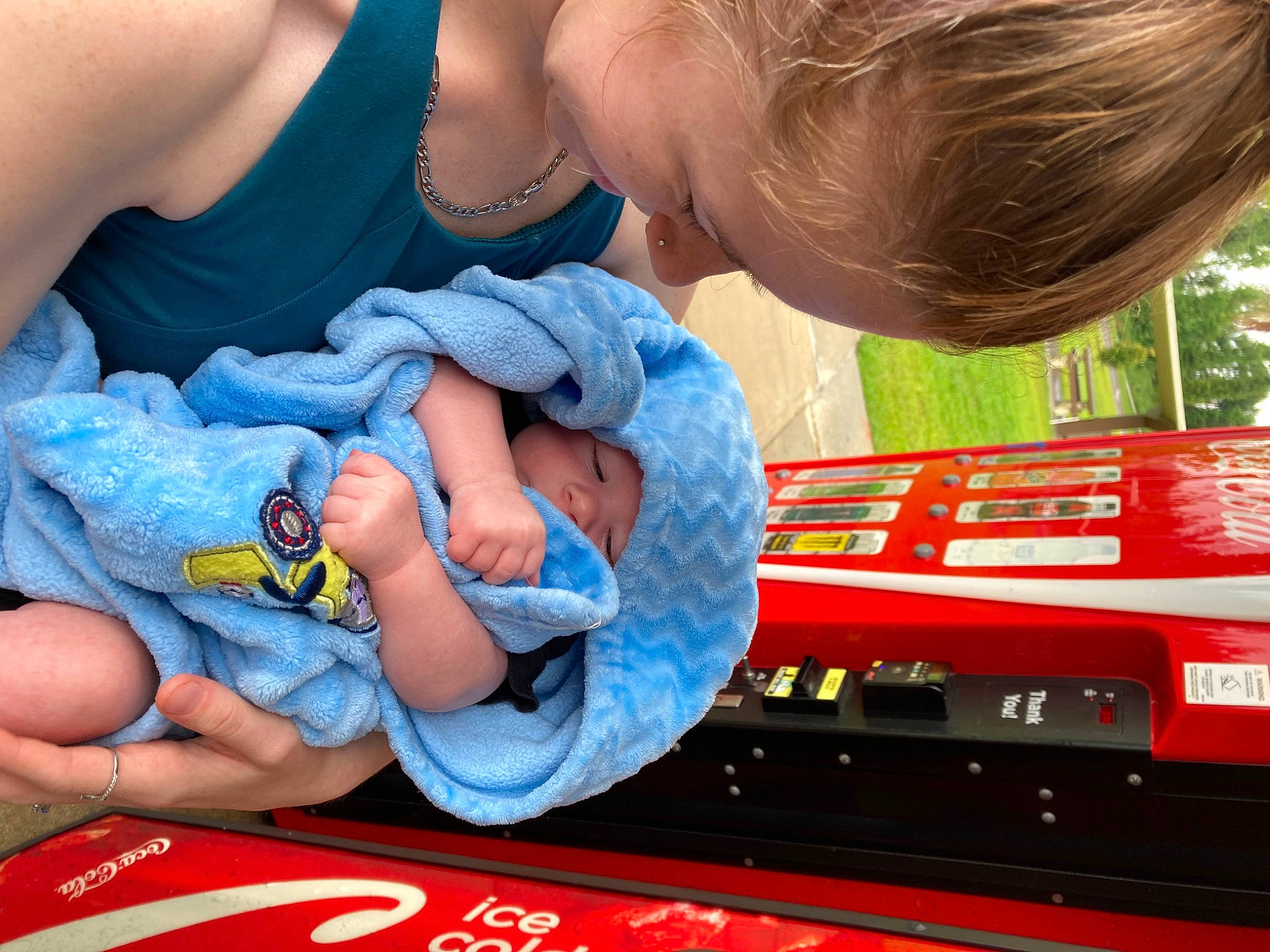 Bryson is registered to the contest to win money with this photo: automotive_exterior, baby, baby_products, baby_toddler_clothing, blue, bumper, carmine, child, comfort, electric_blue, finger, fun, happy, headwear, nail, pattern, person, plant, play, sitting