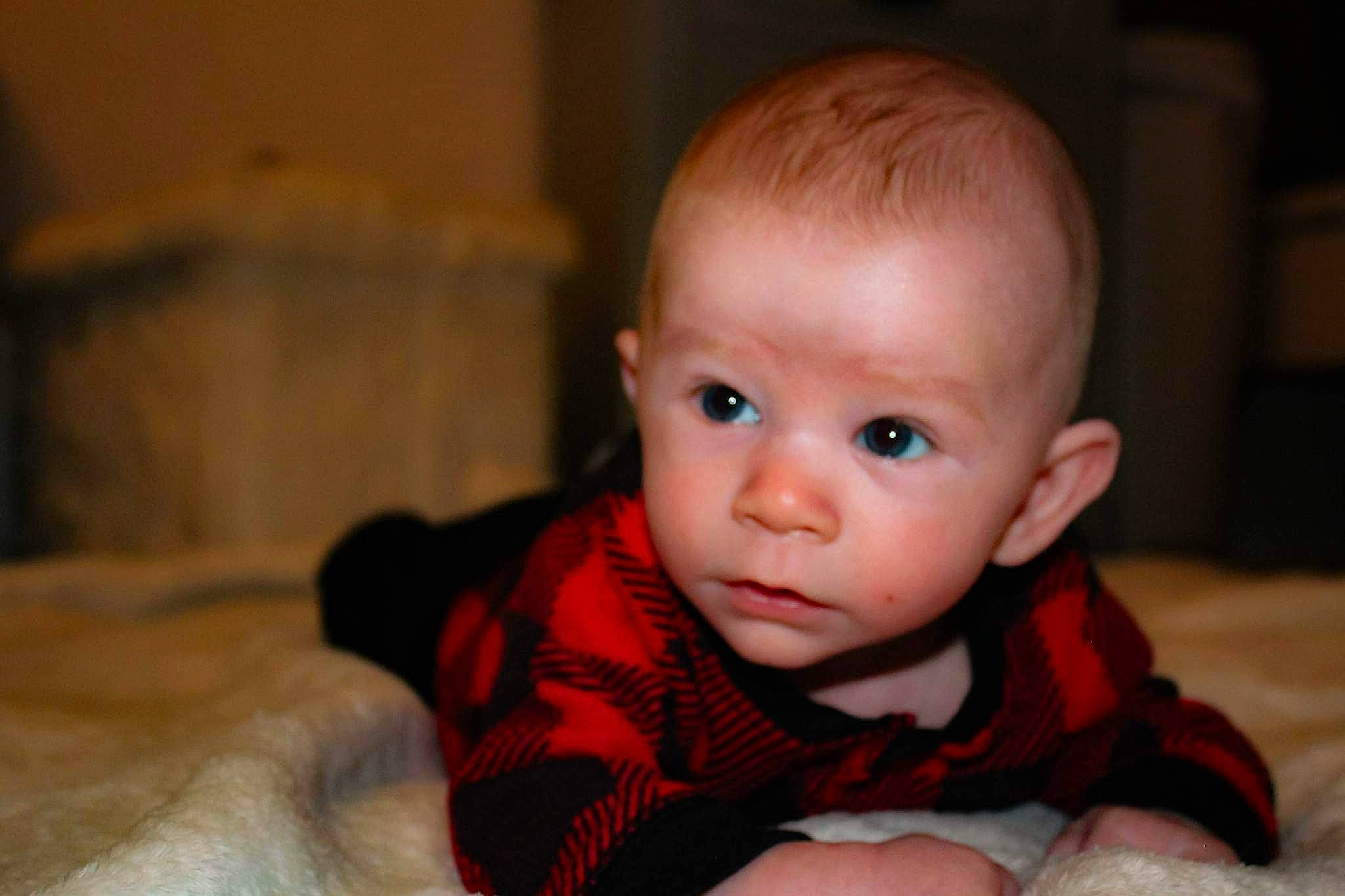 Bryson is registered to the contest to win money with this photo: baby, baby_toddler_clothing, cheek, child, comfort, flash_photography, flooring, fun, happy, hardwood, iris, nose, pattern, person, room, sitting, skin, sleeve, smile, toddler