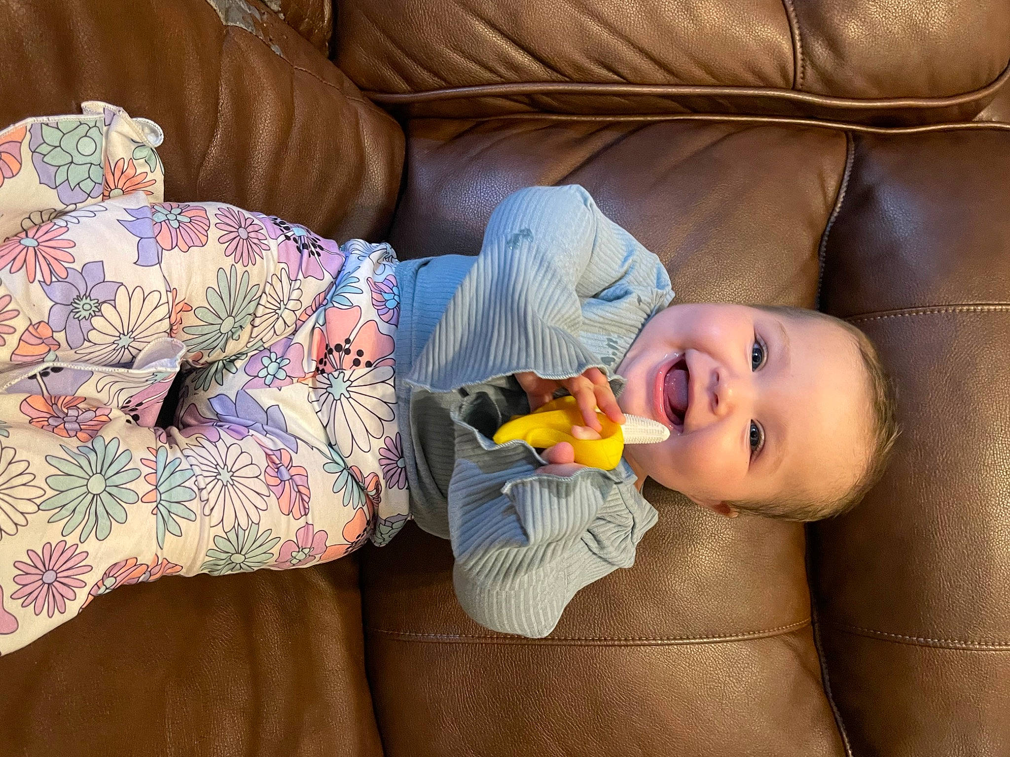 Kali is registered to the contest to win money with this photo: baby, baby_toddler_clothing, cheek, child, comfort, couch, happy, joy, linens, lip, mammal, mouth, person, product, room, sitting, skin, smile, studio_couch, textile