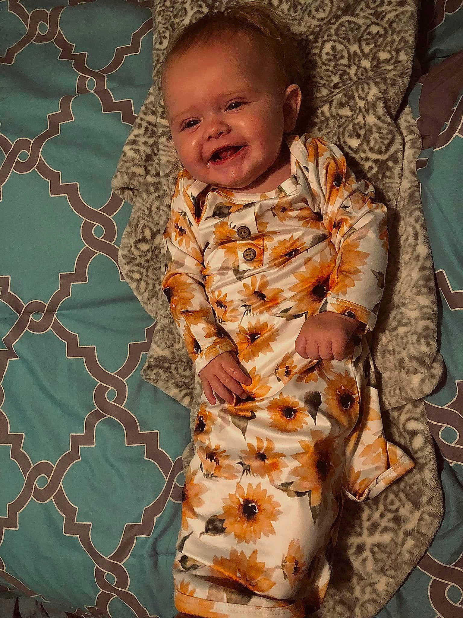 Emersyn joined the competition — help win amazing prizes! baby, baby_toddler_clothing, child, comfort, face, flooring, fun, happy, linens, mesh, organ, pattern, peach, person, room, skin, sleeve, smile, textile, toddler