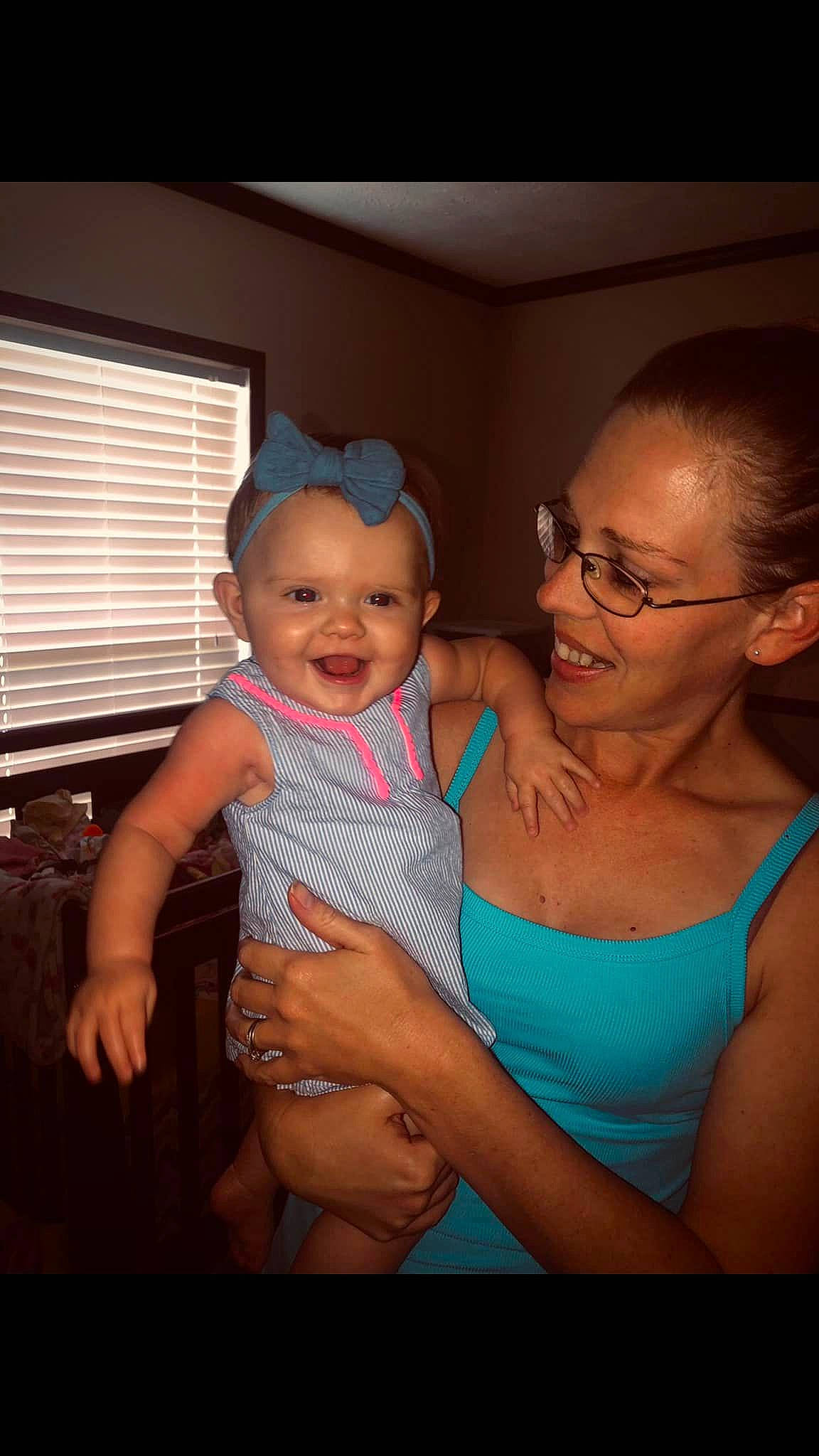 Emersyn is registered to the contest to win money with this photo: arm, baby, comfort, elbow, face, facial_expression, flash_photography, fun, gesture, happy, iris, joy, mouth, person, shoulder, skin, smile, t_shirt, thumb, toddler