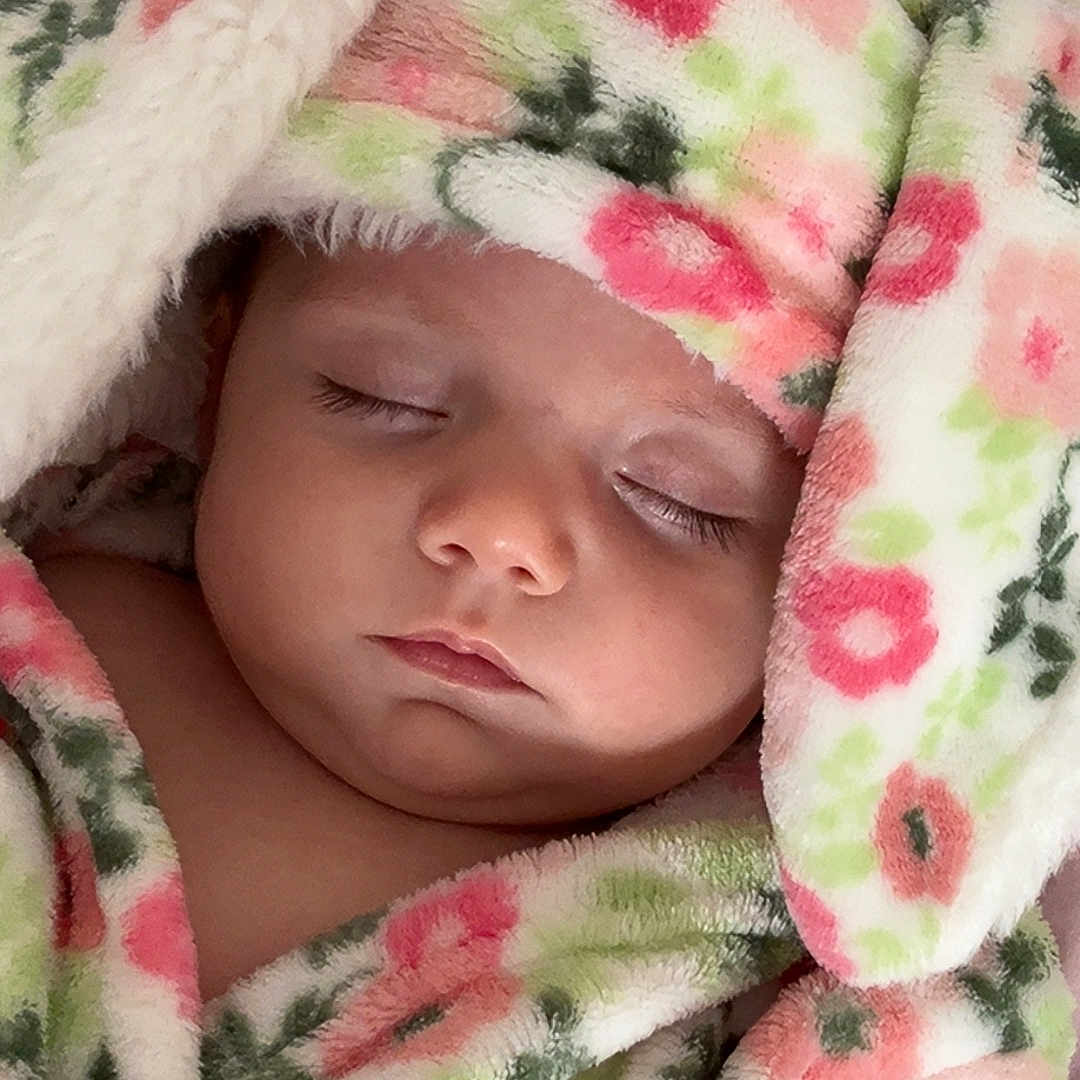 Kehlonni joined the competition — help win amazing prizes! baby, bed, blanket, bonnet, clothing, face, furniture, hat, head, hood, newborn, person, photography, portrait, quilt, sleeping, towel