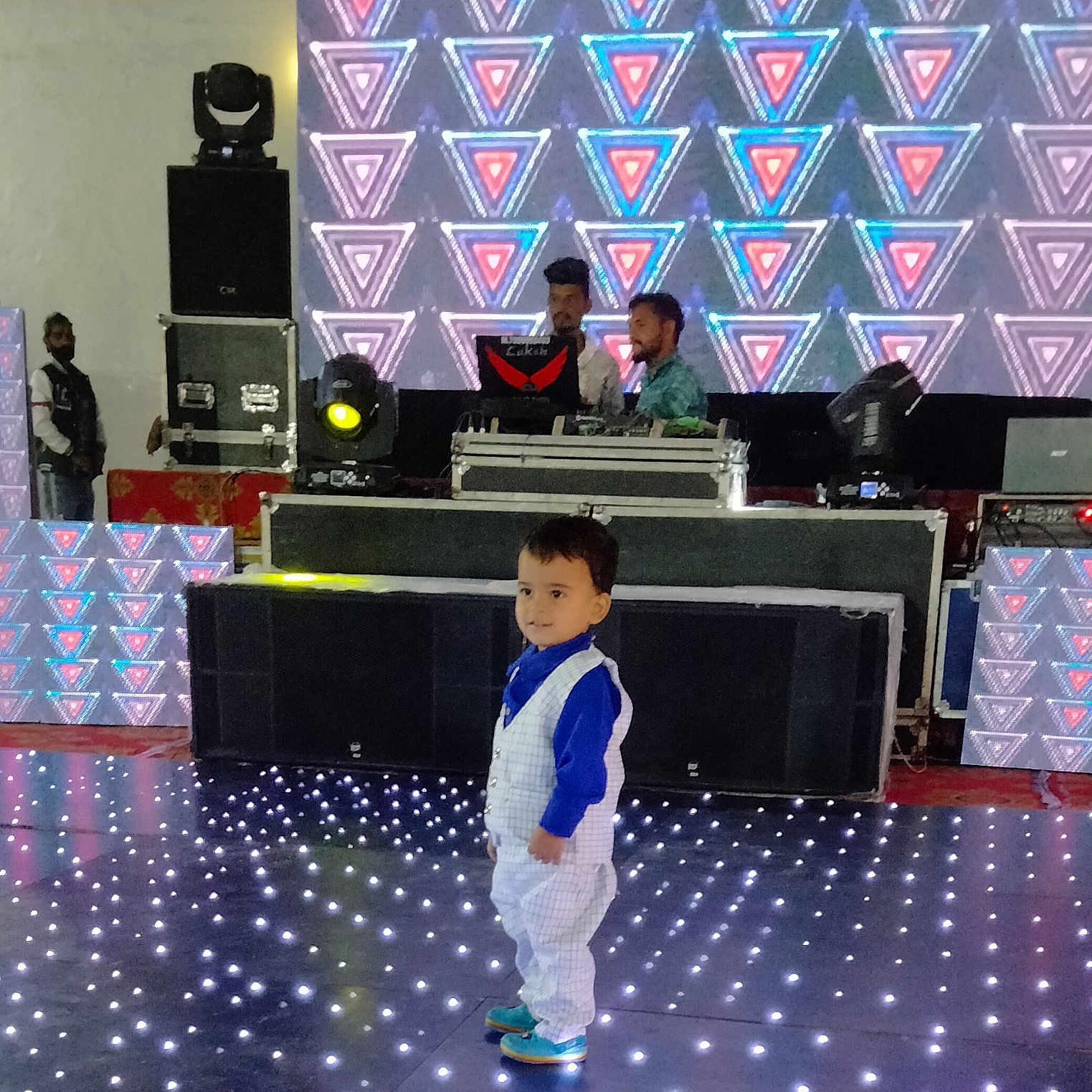 Shivam joined the competition — help win amazing prizes! background, child, clothing, colorful, dance_floor, dj, dj_equipment, entertainment, event, indoor, led_lights, lights, music, party, performance, person, shoes, stage, technology, toddler