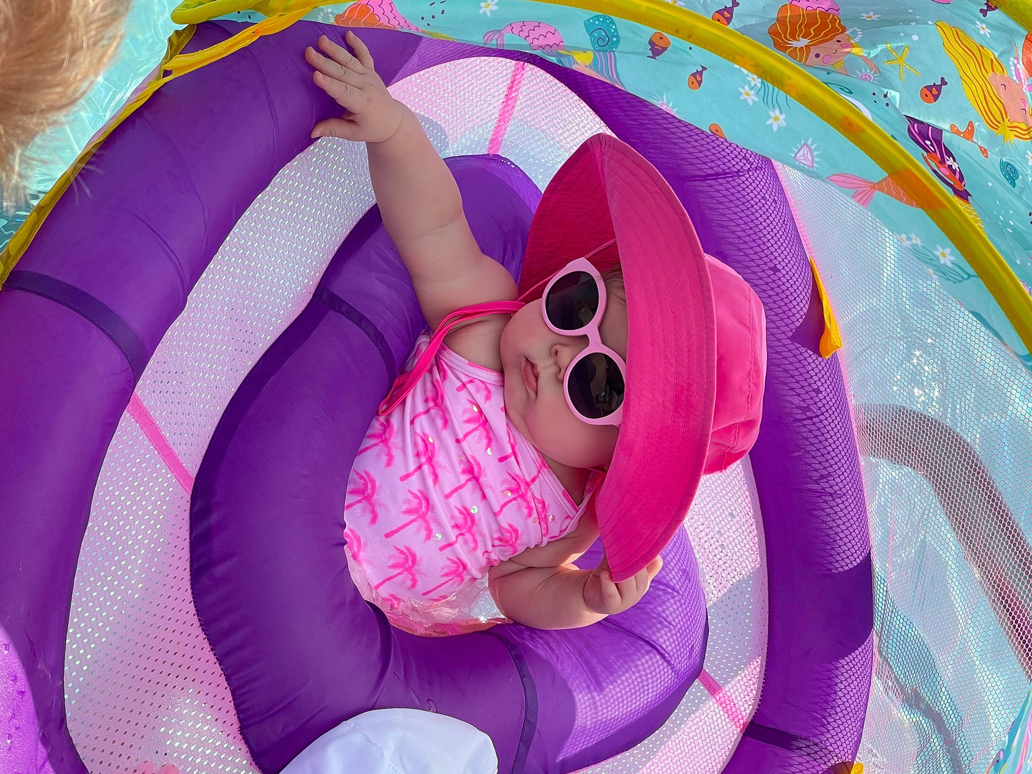 Sofia joined the competition — help win amazing prizes! baby_products, circle, comfort, eyewear, fun, goggles, happy, hat, leisure, magenta, pattern, person, personal_protective_equipment, pink, product, purple, recreation, sunglasses, textile, toddler