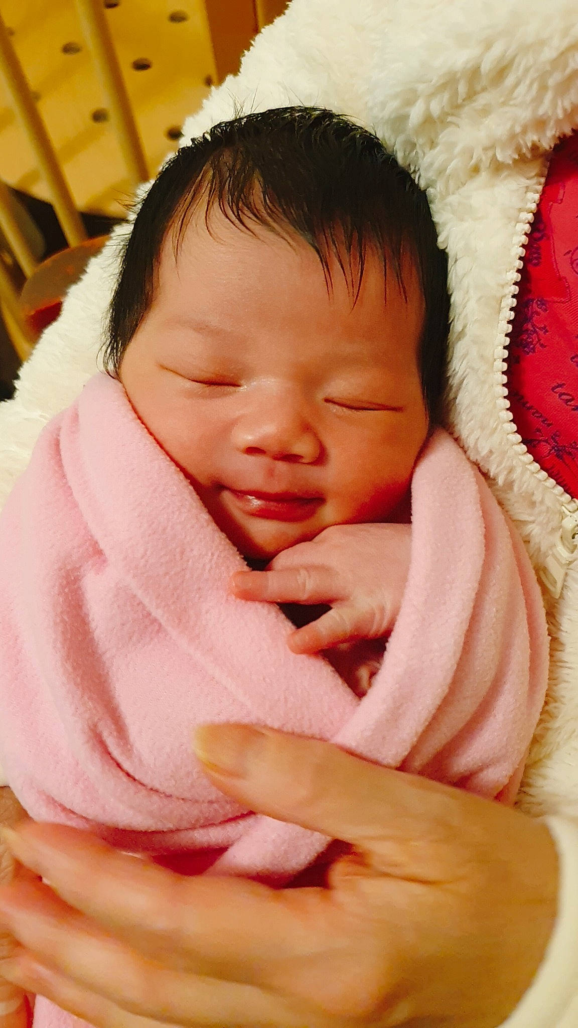 Clover is registered to the contest to win money with this photo: baby, baby_toddler_clothing, cheek, chin, comfort, eyebrow, face, finger, gesture, happy, iris, lip, mouth, nose, person, pink, product, skin, smile, toddler