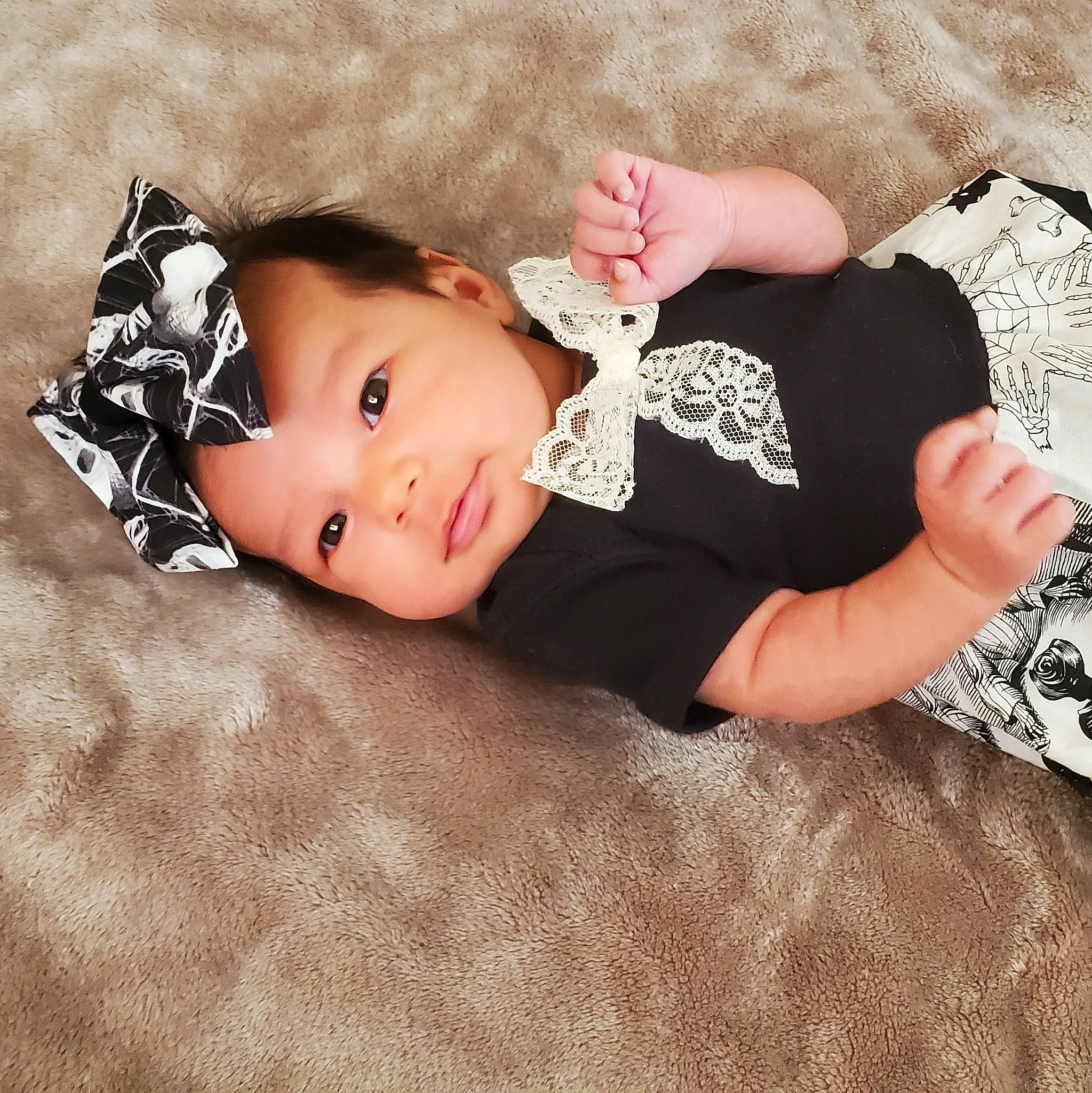 Whisper joined the competition — help win amazing prizes! baby, baby_products, baby_toddler_clothing, child, comfort, dress, fashion_accessory, hat, head, headgear, human_body, linens, outerwear, pattern, person, sitting, skin, sleeve, toddler, wood