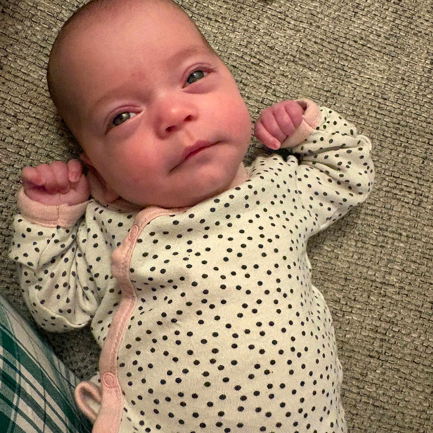 Kamea joined the competition — help win amazing prizes! baby, carpet, child, cozy, cute, face, floor, hand, indoor, infant, lying_down, onesie, person, pink_trim, polka_dot, portrait, skin, sleepwear, small_fingers, young