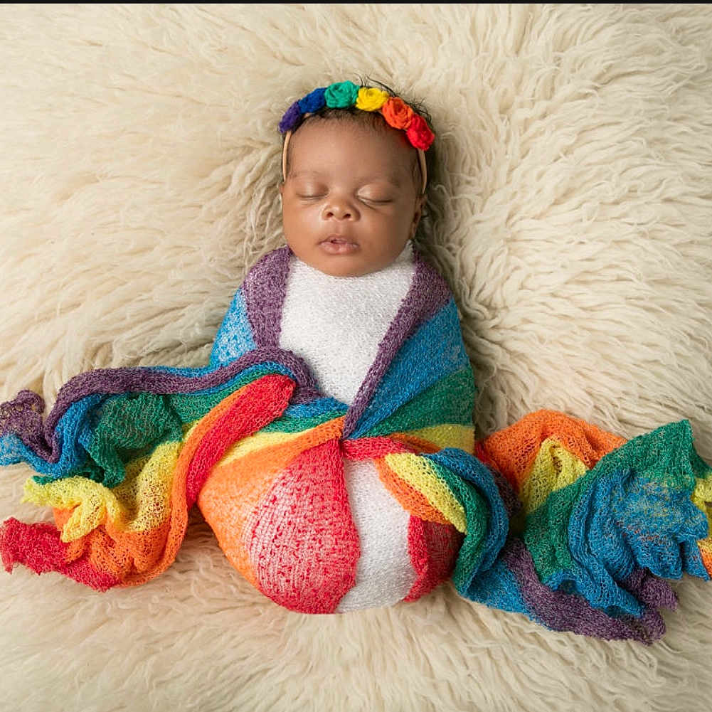 Reign joined the competition — help win amazing prizes! art, baby, baby_products, baby_toddler_clothing, baby_toys, child, craft, creative_arts, eye, fashion_accessory, happy, pattern, sitting, textile, thread, toddler, visual_arts, wood, wool, woolen