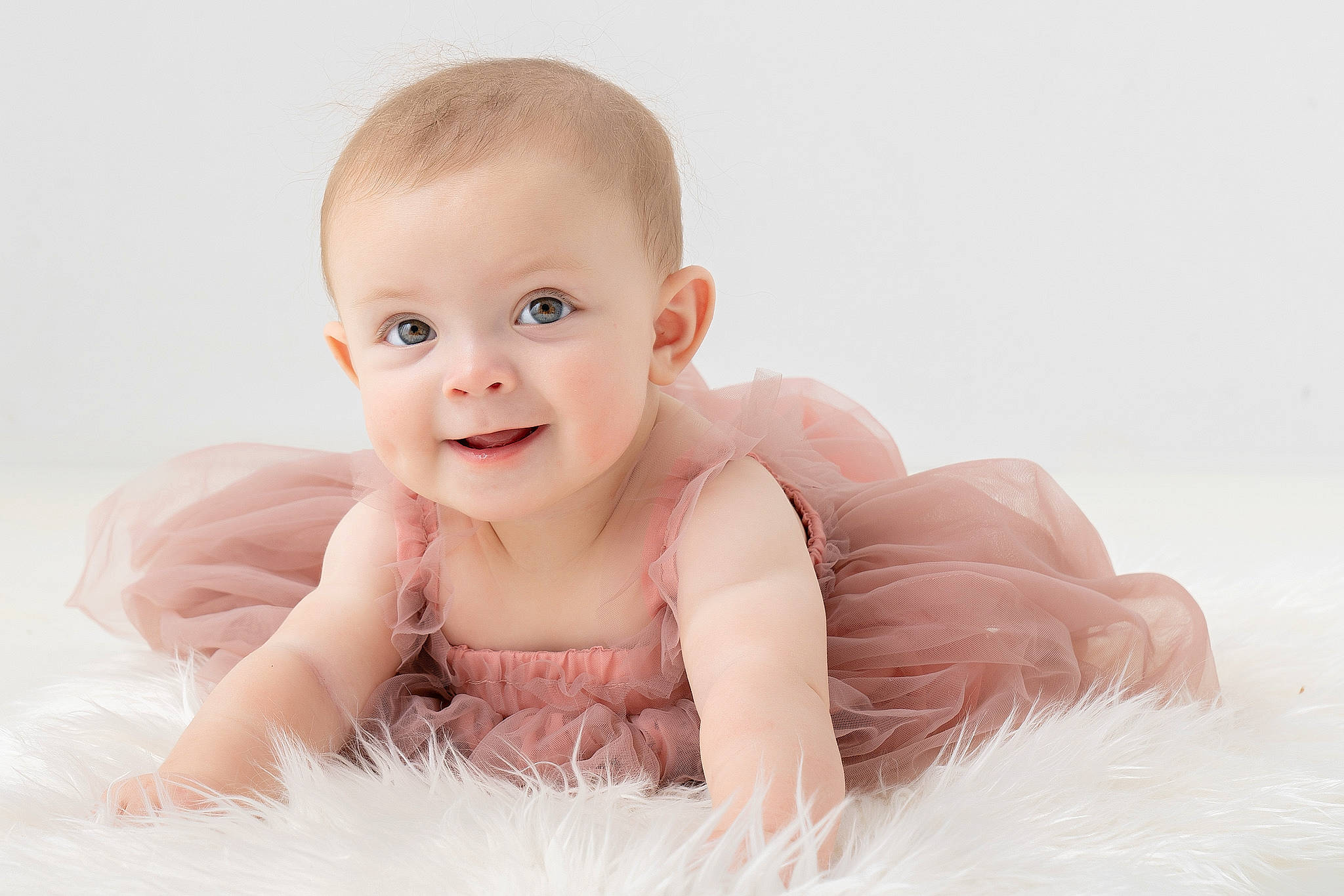 Josephine joined the competition — help win amazing prizes! arm, baby, baby_toddler_clothing, cheek, child, comfort, eye, flash_photography, flooring, fun, gesture, happy, joy, laugh, person, portrait, portrait_photography, sitting, smile, stomach