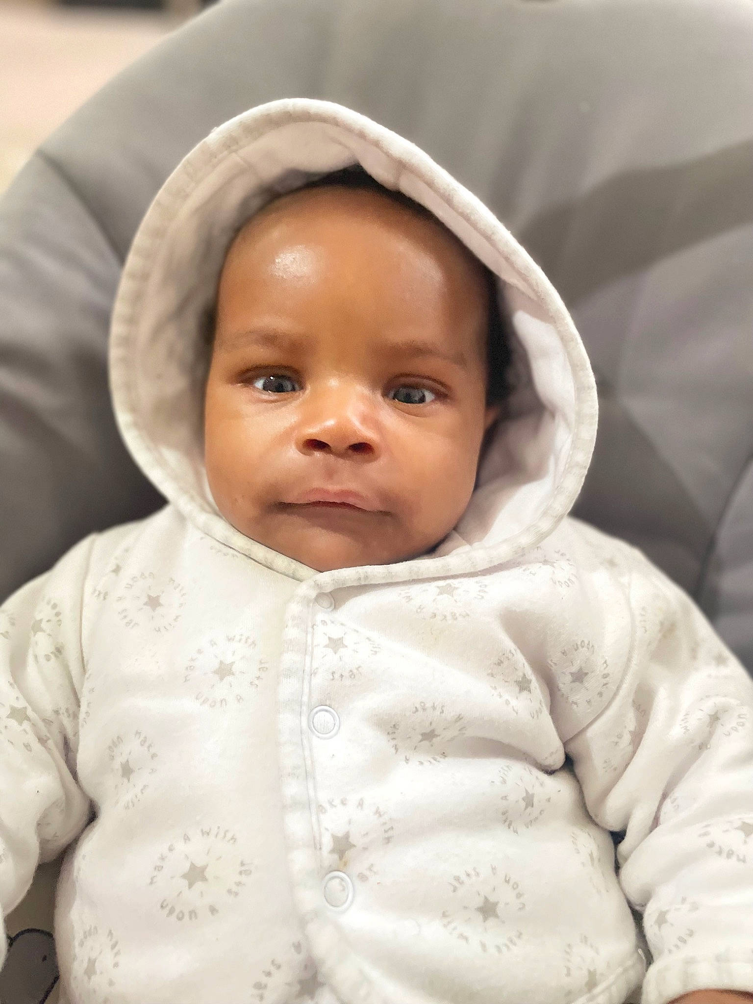 Gracious is registered to the contest to win money with this photo: baby, baby_products, baby_toddler_clothing, cheek, child, collar, comfort, eyebrow, face, happy, hat, linens, outerwear, person, portrait_photography, skin, sleeve, smile, toddler