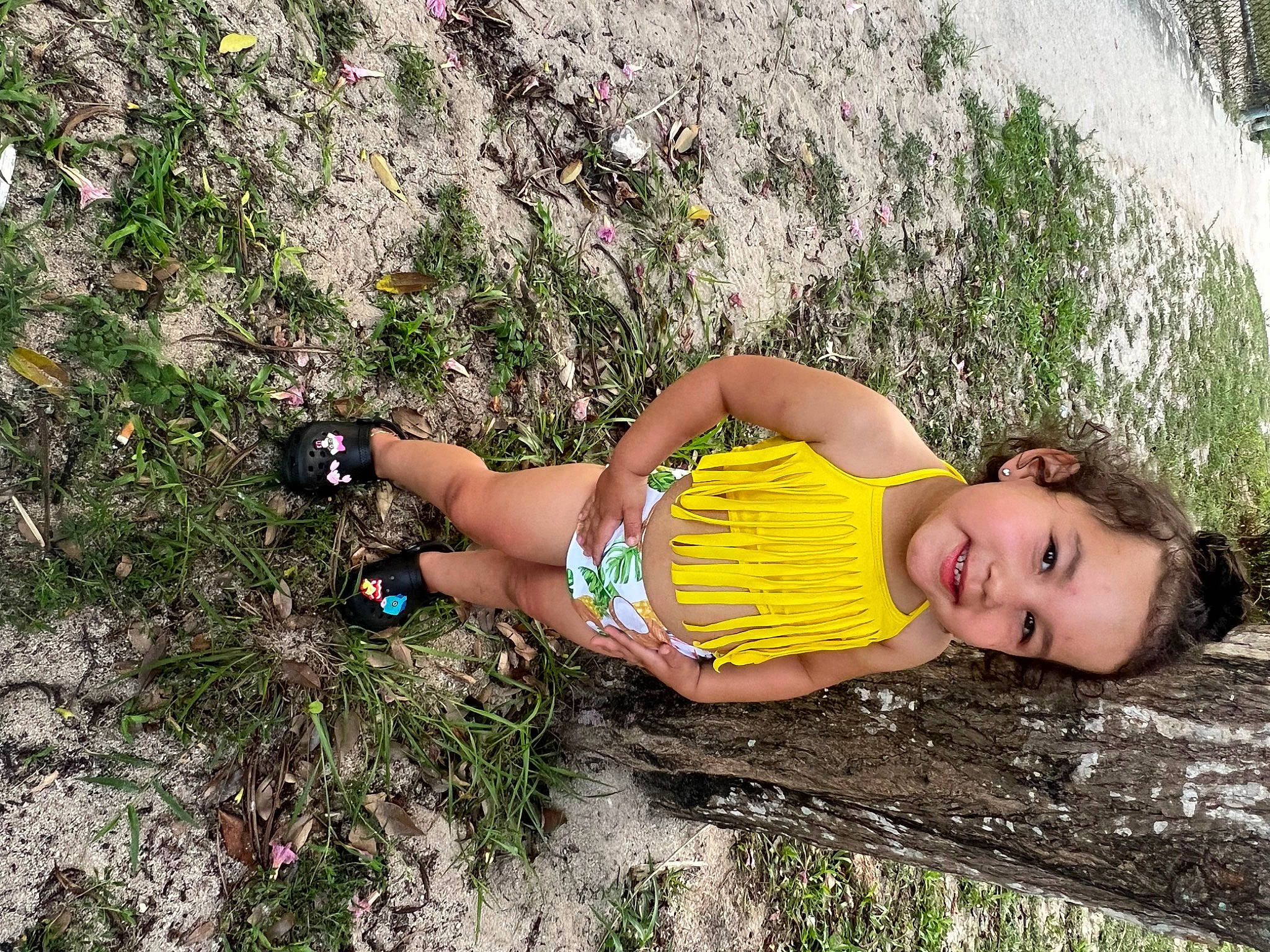 Alaya Nicole is registered to the contest to win money with this photo: face, fun, grass, grass_family, happy, human_leg, joy, landscape, leisure, natural_environment, people_in_nature, person, plant, recreation, shorts, smile, sneakers, soil, thigh, tree