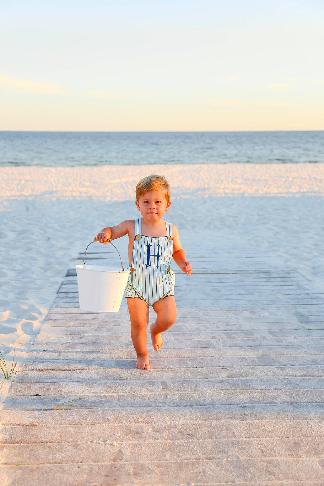 Hayes joined the competition — help win amazing prizes! azure, barefoot, beach, cloud, happy, horizon, joy, leisure, people_in_nature, people_on_beach, person, sand, shore, shorts, sky, smile, summer, sunlight, t_shirt, toddler