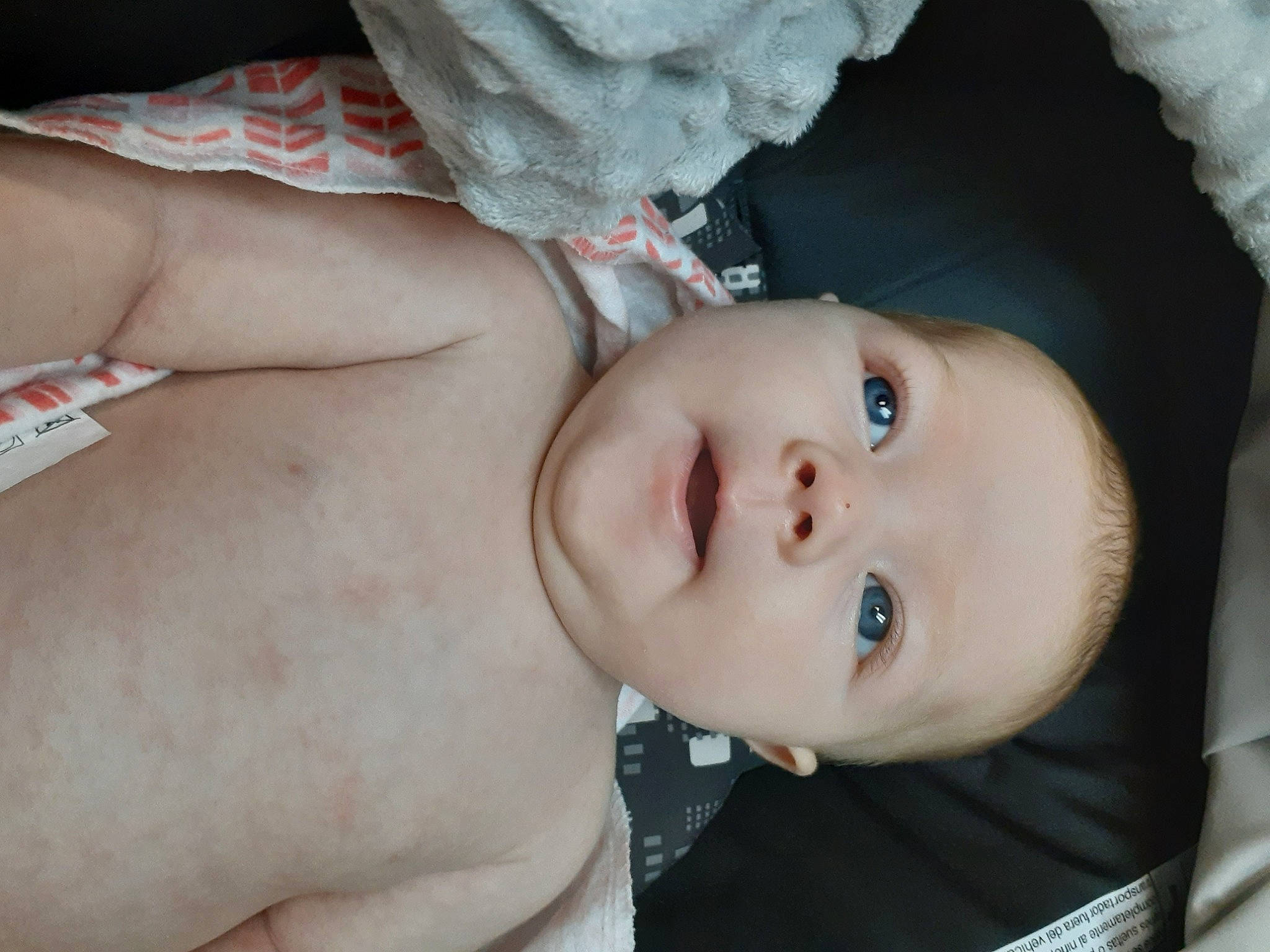 Lilith is registered to the contest to win money with this photo: arm, baby, barechested, cheek, chest, child, chin, eye, eyebrow, face, hand, head, lip, mouth, muscle, neck, nose, person, skin, toddler