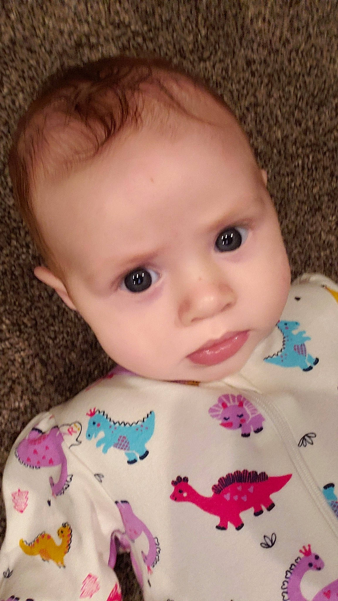 Mae is registered to the contest to win money with this photo: baby, beauty, cheek, child, chin, close_up, ear, eye, eyebrow, face, forehead, head, iris, lip, mouth, nose, person, pink, product, skin